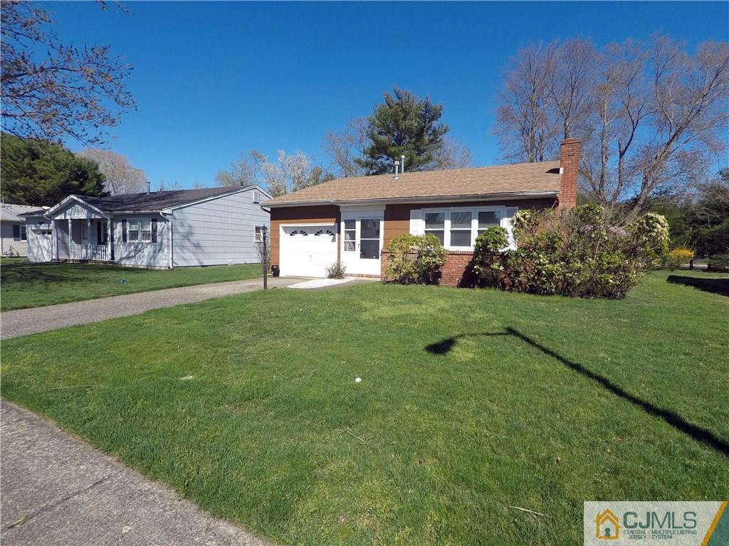 125 Georgetown Road Toms River, NJ 08757 - Photo 25 of 25 a view of a house with a big yard potted plants and large tree