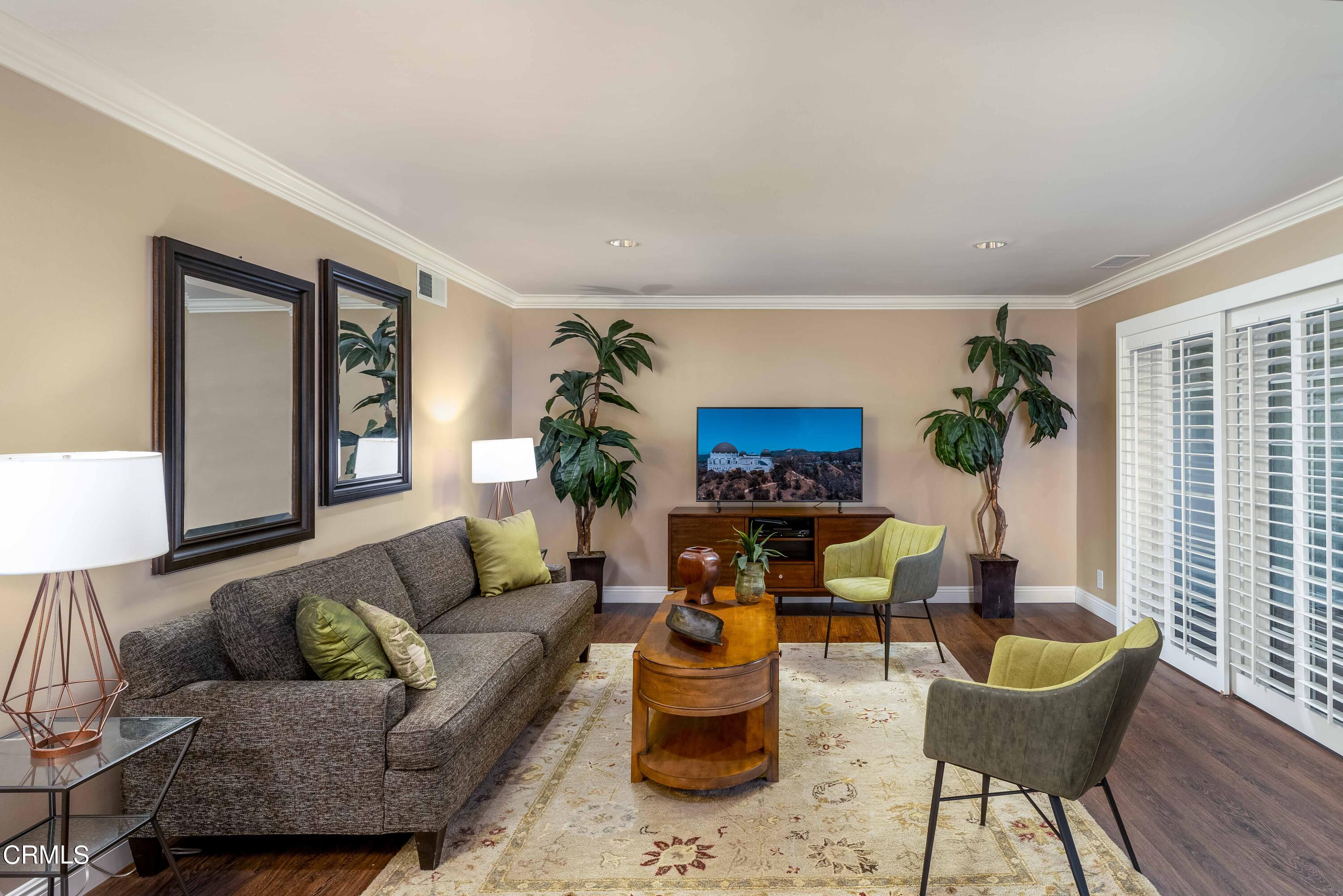 1038 Leandra Lane Arcadia, CA 91006 - Photo 11 of 36 a living room with furniture and a potted plant