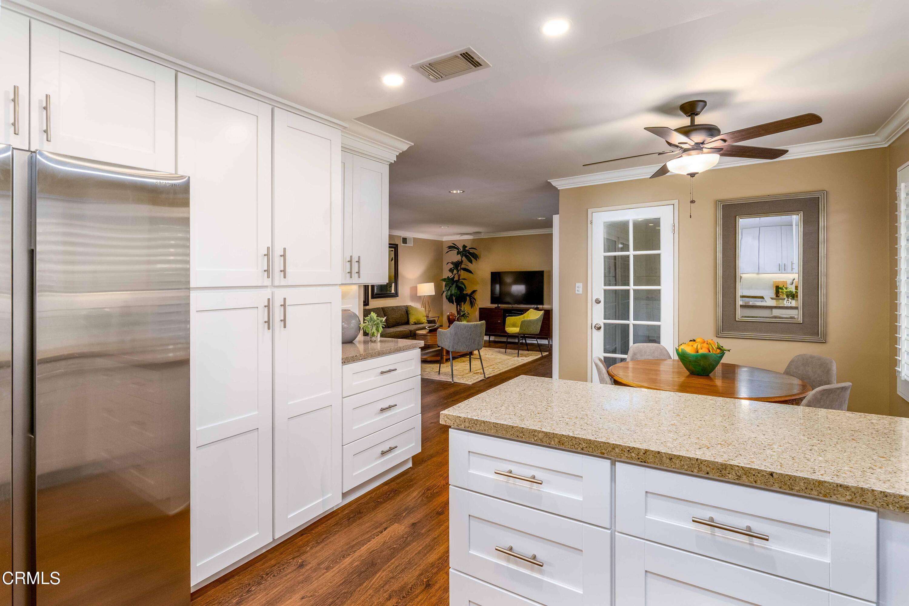 1038 Leandra Lane Arcadia, CA 91006 - Photo 17 of 36 a kitchen with refrigerator a sink and cabinets