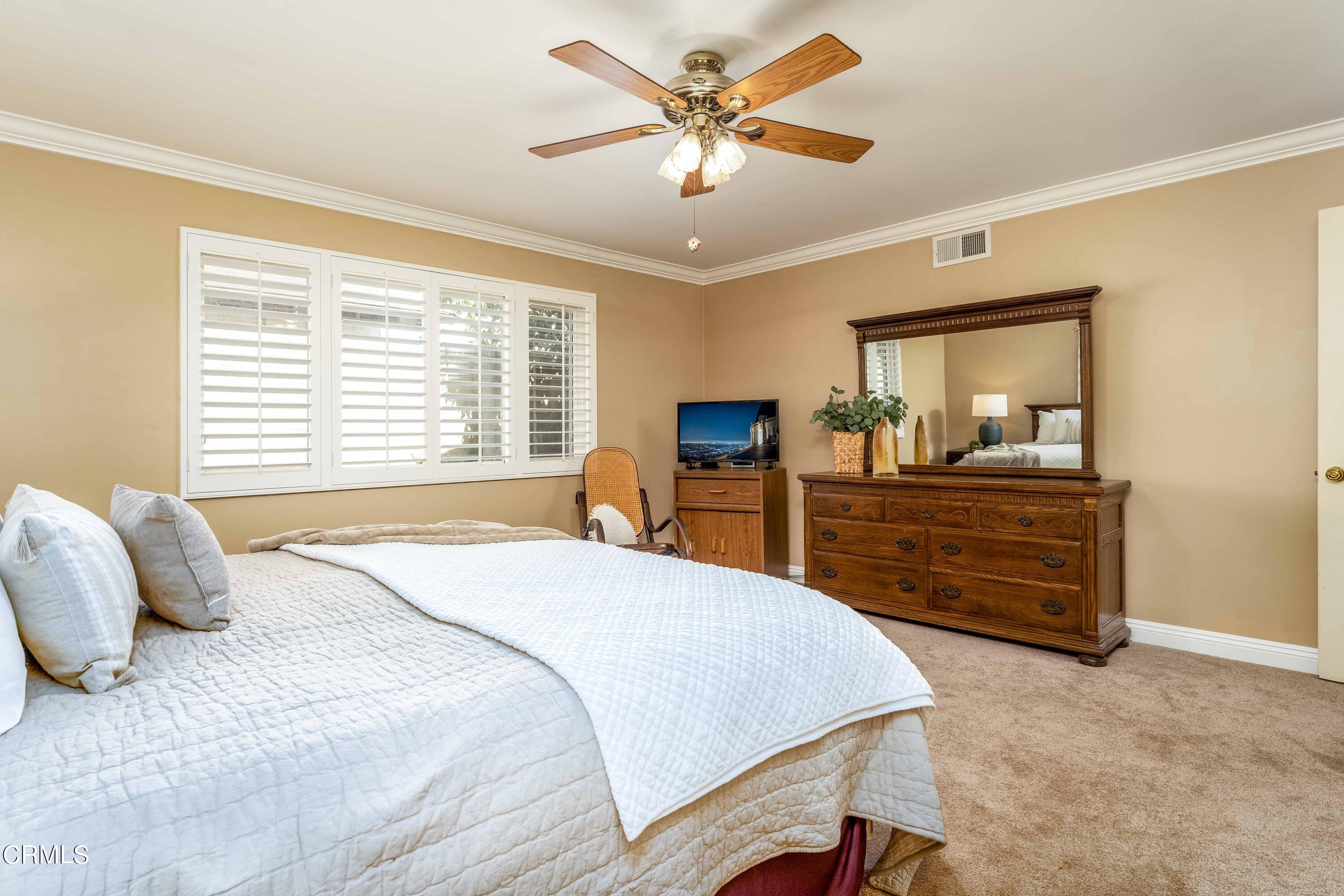 1038 Leandra Lane Arcadia, CA 91006 - Photo 19 of 36 a bedroom with a bed and a dresser