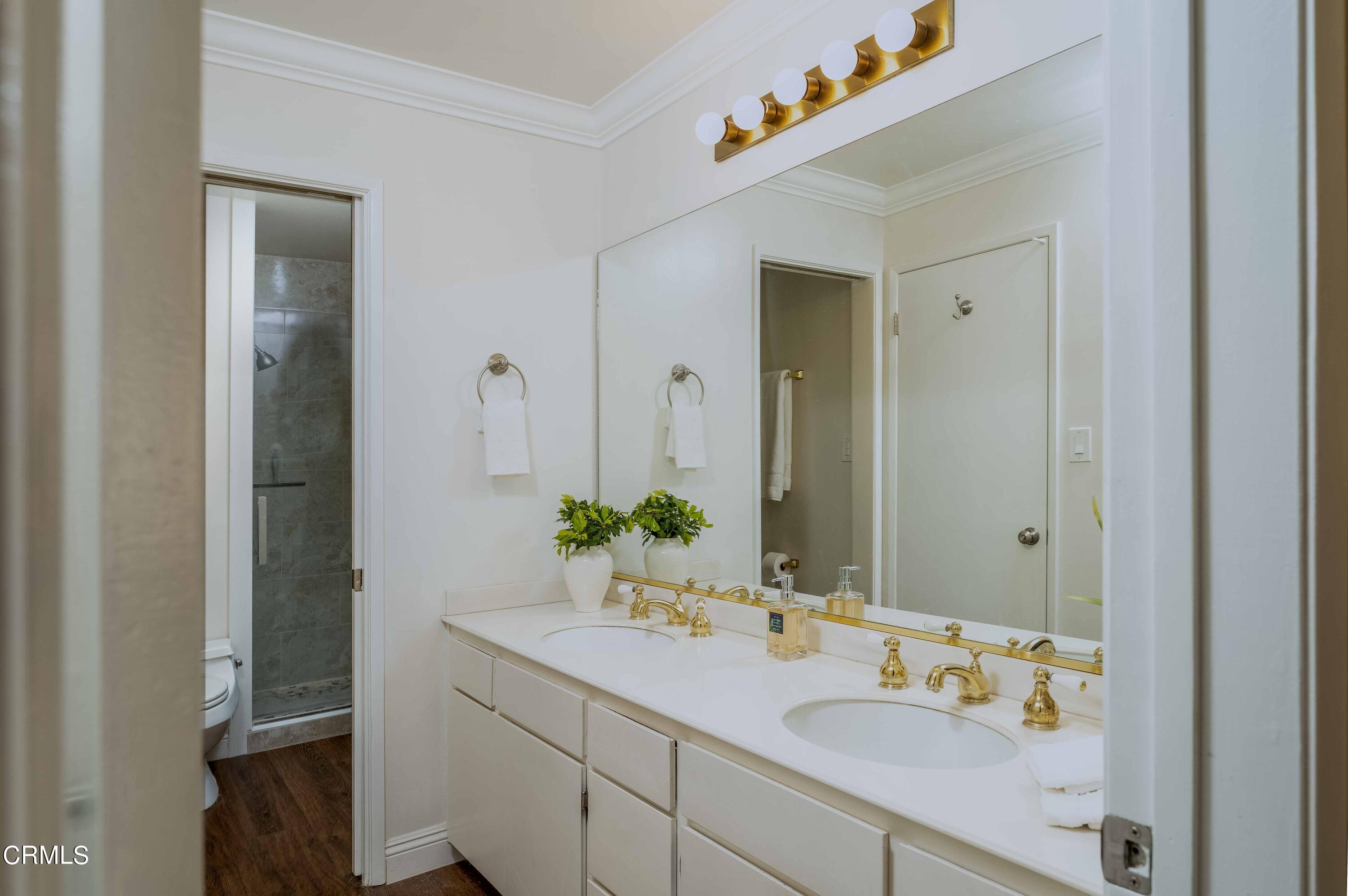 1038 Leandra Lane Arcadia, CA 91006 - Photo 20 of 36 a bathroom with a sink and a mirror