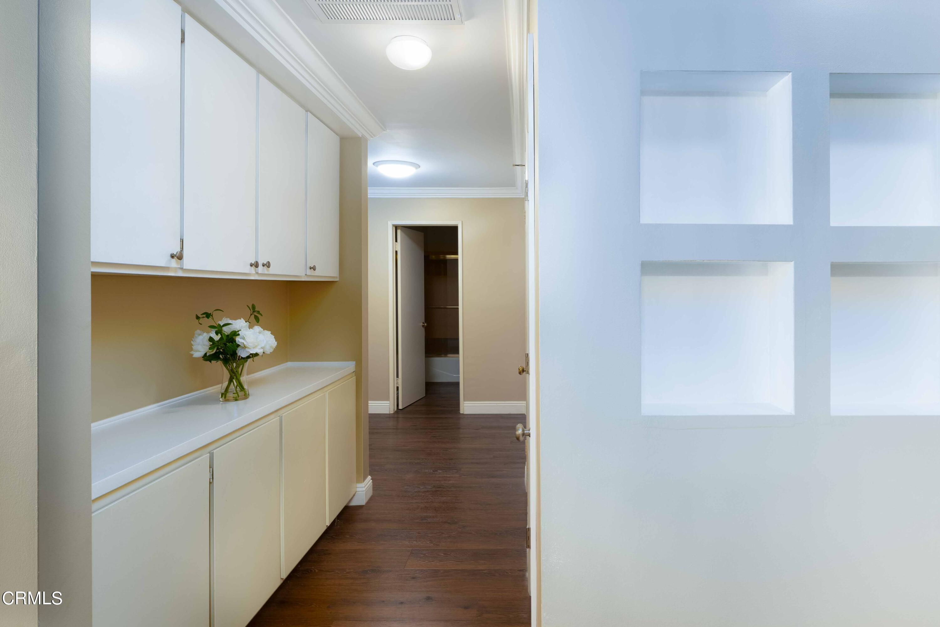 1038 Leandra Lane Arcadia, CA 91006 - Photo 23 of 36 a hallway view with wooden floor