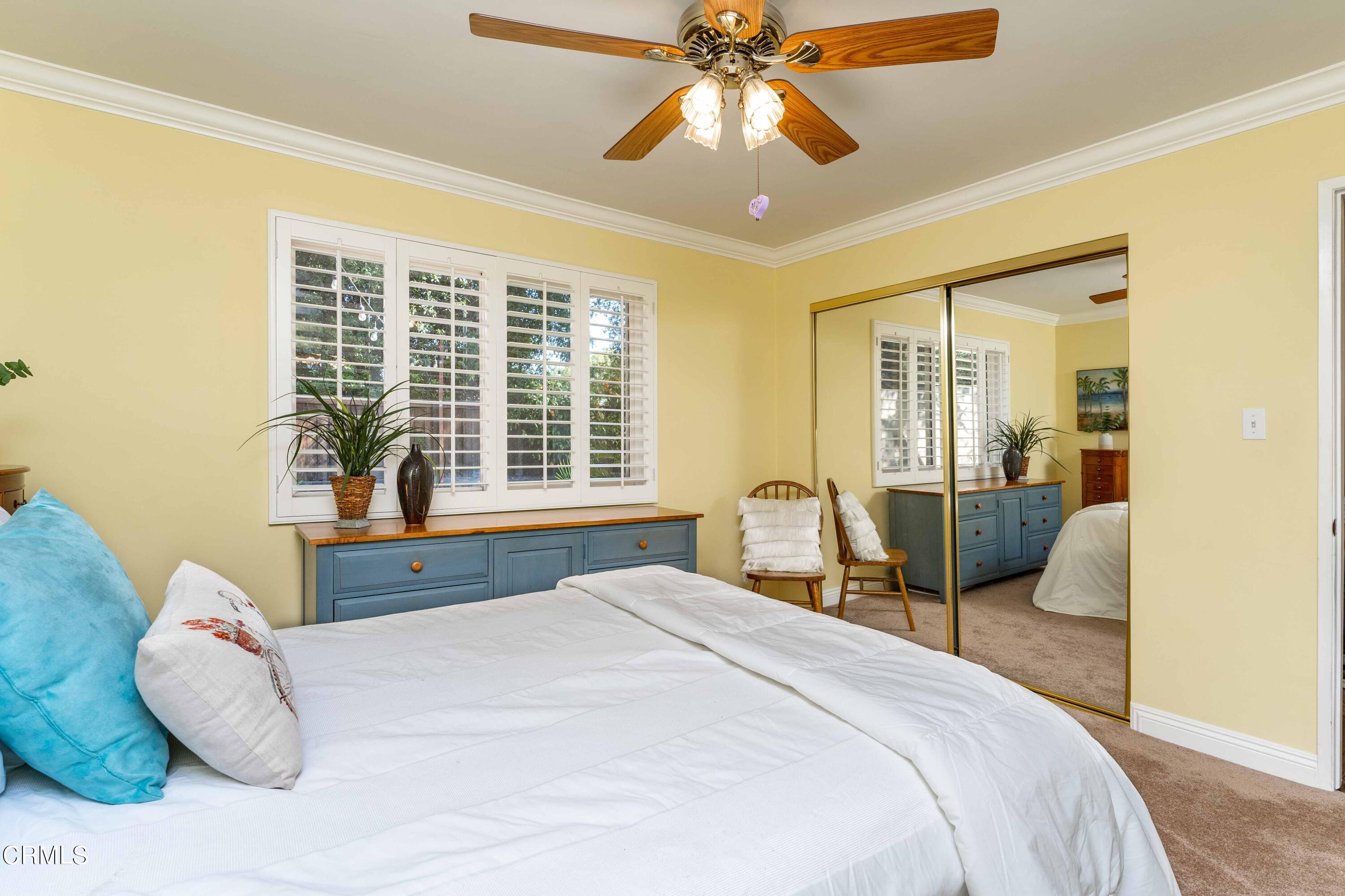 1038 Leandra Lane Arcadia, CA 91006 - Photo 24 of 36 a bedroom with a large bed and a large window