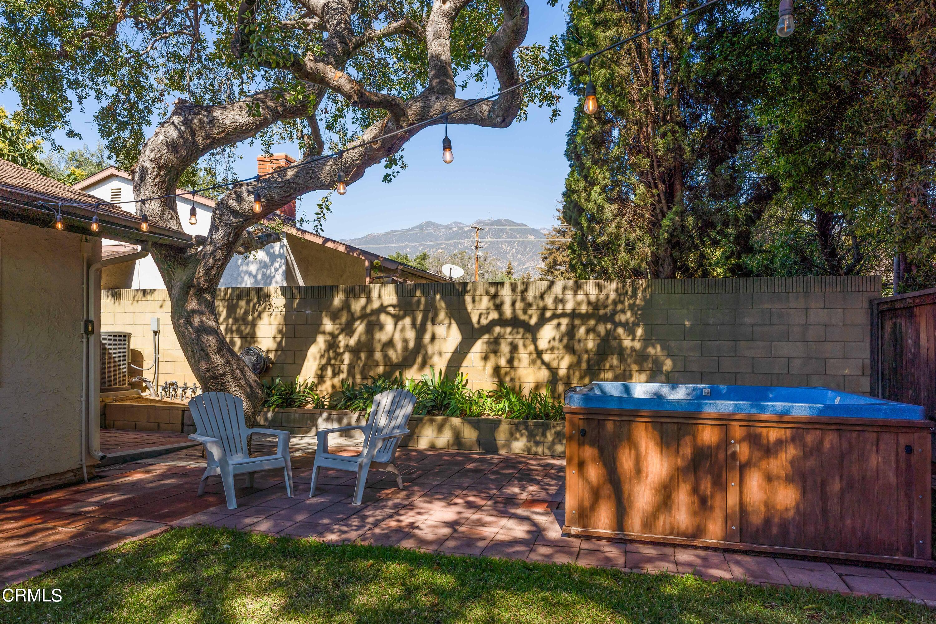 1038 Leandra Lane Arcadia, CA 91006 - Photo 33 of 36 a view of outdoor space with seating area and trees around