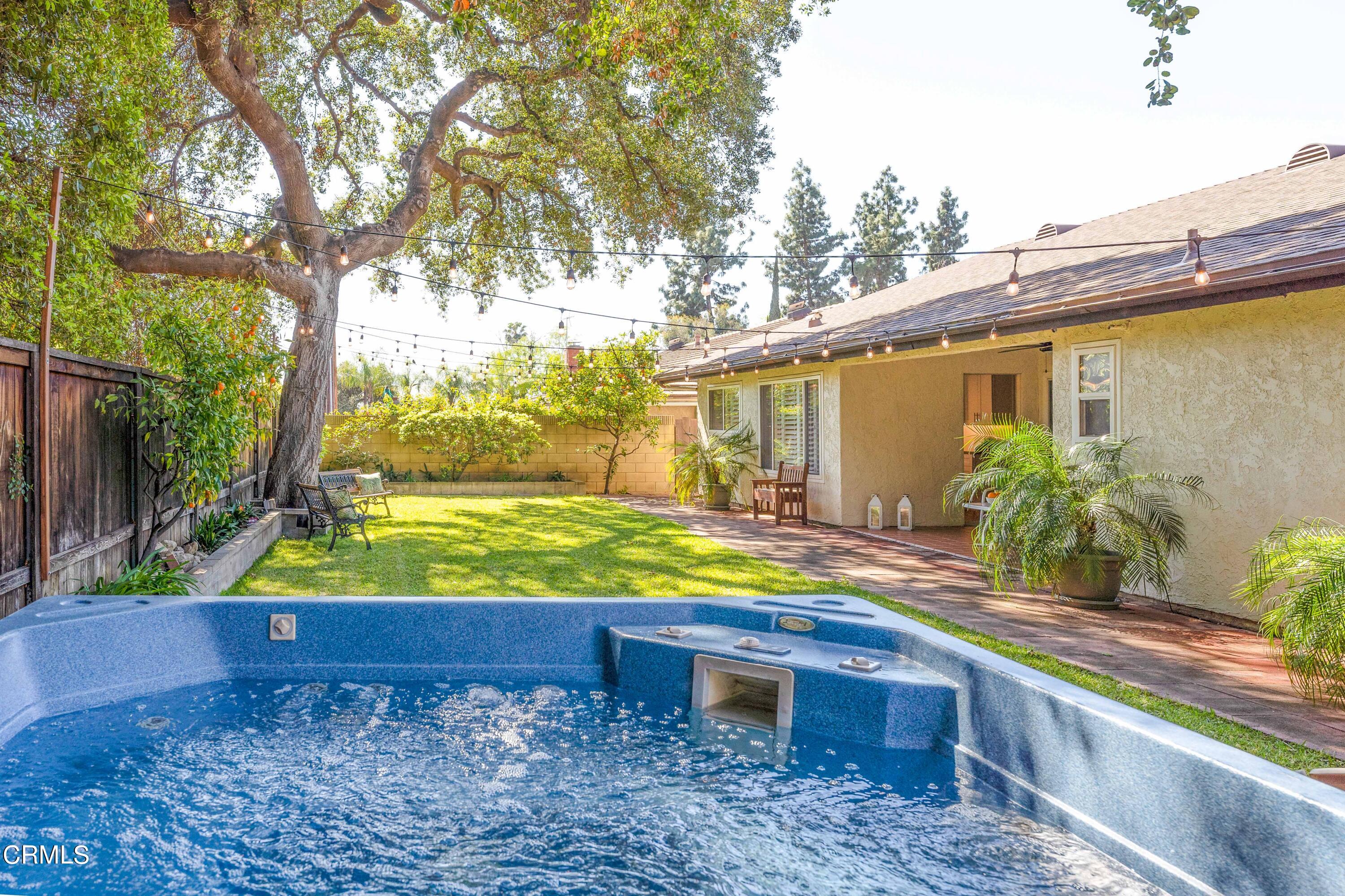 1038 Leandra Lane Arcadia, CA 91006 - Photo 34 of 36 a view of a backyard with plants and a patio