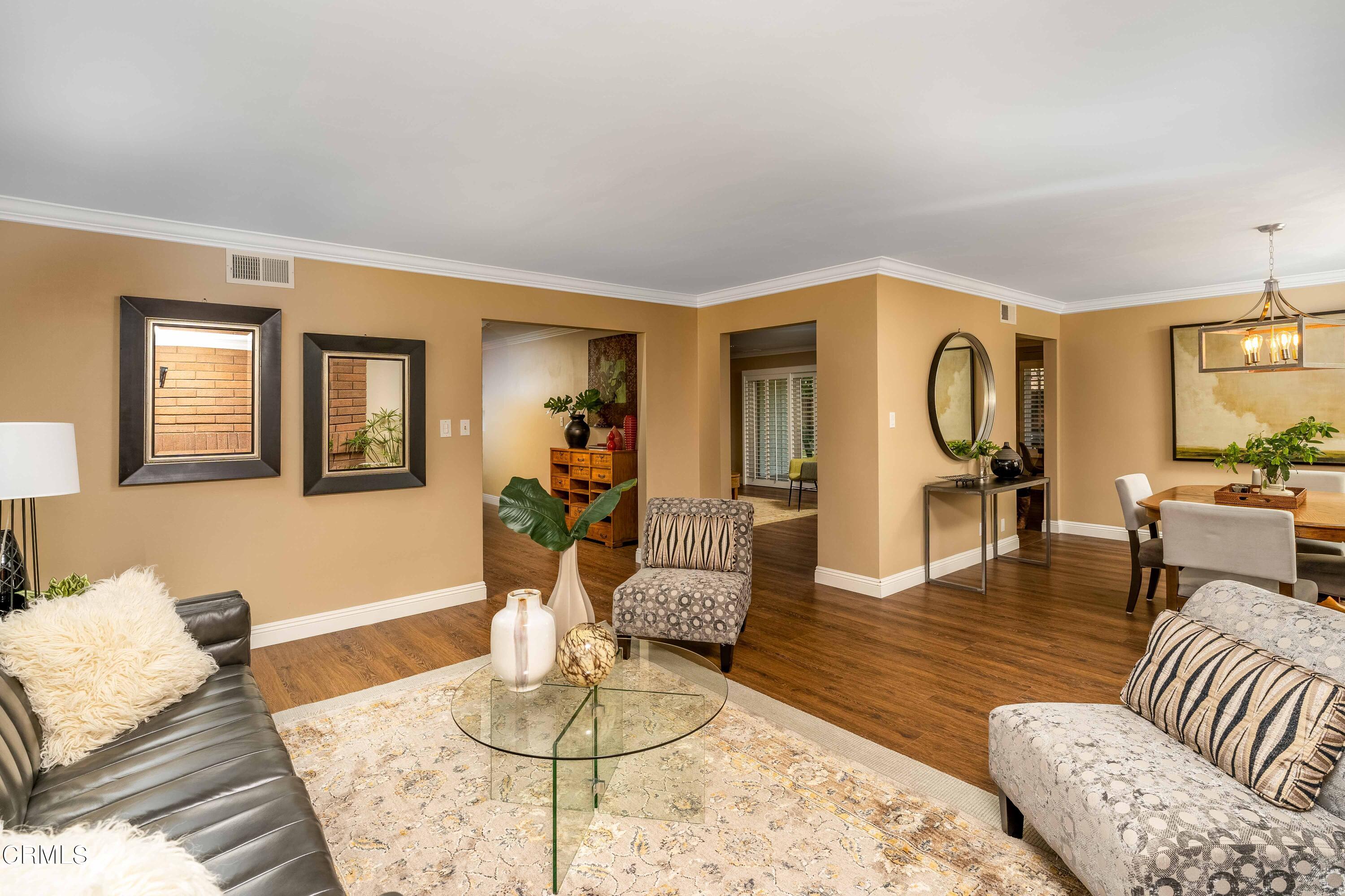 1038 Leandra Lane Arcadia, CA 91006 - Photo 8 of 36 a living room with furniture and wooden floor