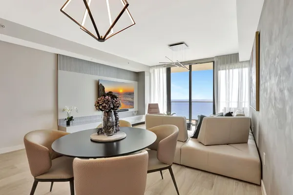 a living room with furniture and a table