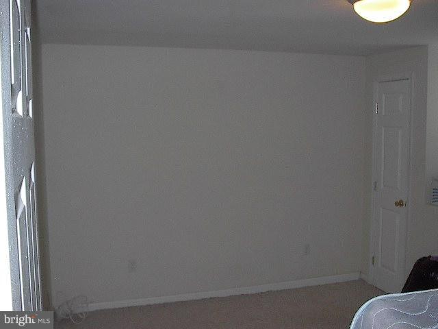 6002 Chesworth Road Baltimore, MD 21228 - Photo 16 of 26 a bathroom with a toilet