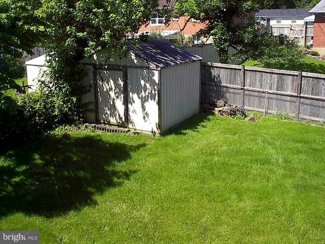 6002 Chesworth Road Baltimore, MD 21228 - Photo 23 of 26 a view of backyard with green space