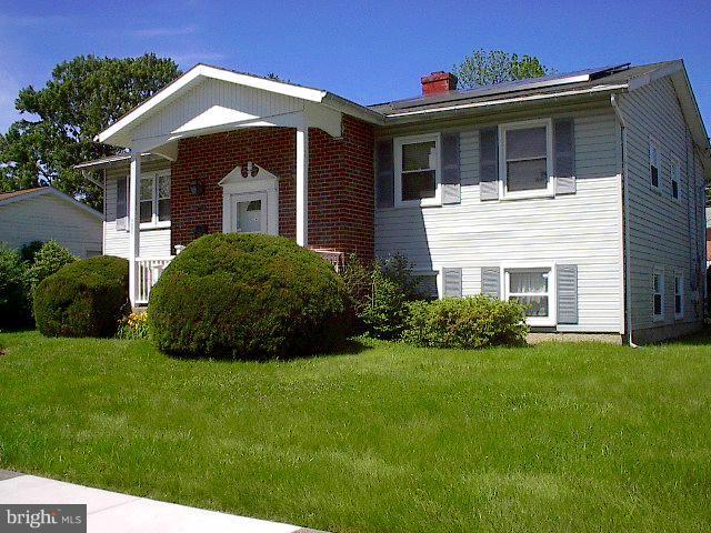 6002 Chesworth Road Baltimore, MD 21228 - Photo 26 of 26 a front view of a house with a yard