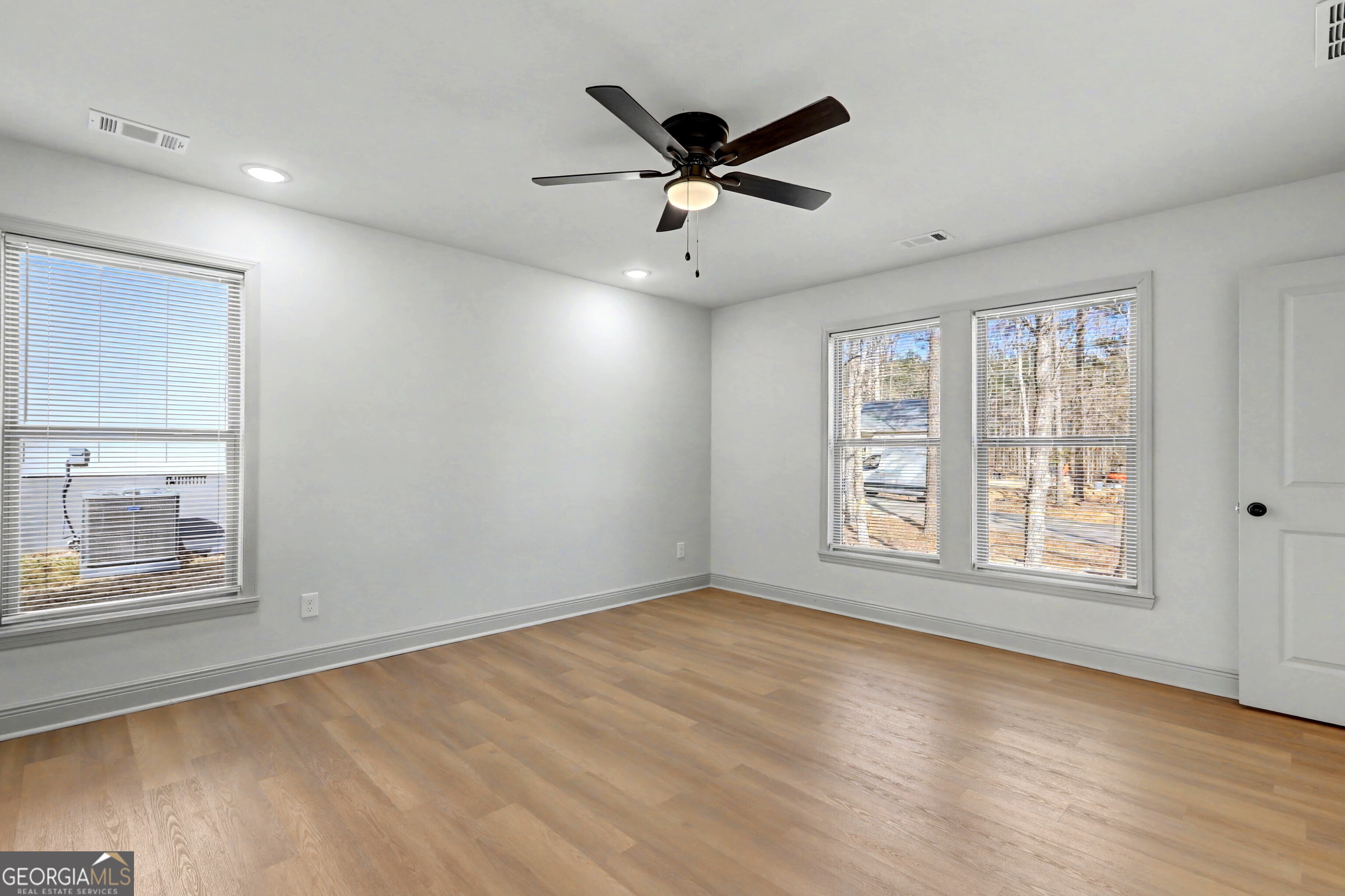 411 Loblolly Ridge Locust Grove, GA 30248 - Photo 14 of 43 a view of an empty room with a window