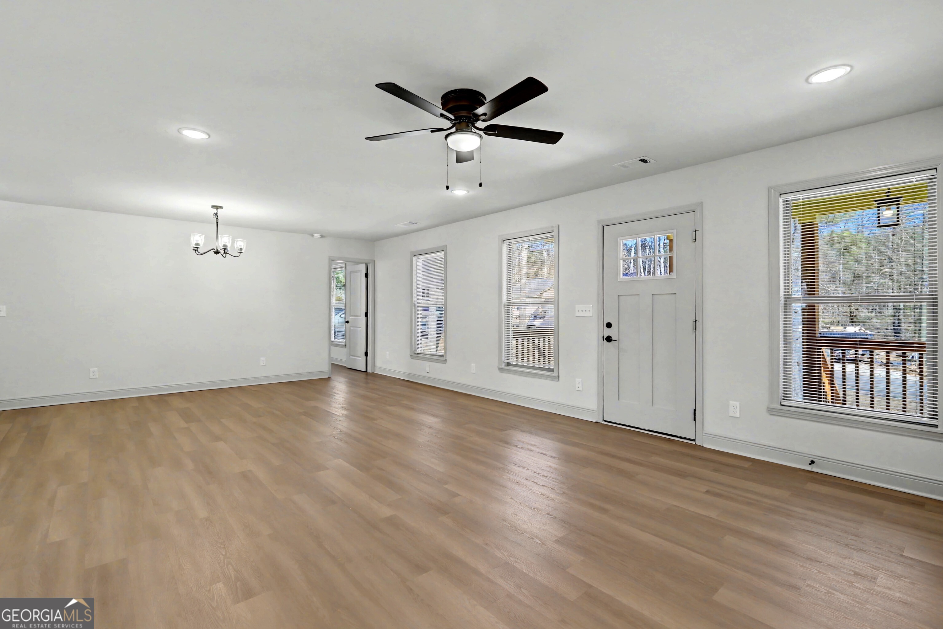 411 Loblolly Ridge Locust Grove, GA 30248 - Photo 2 of 43 a view of an empty room with a window