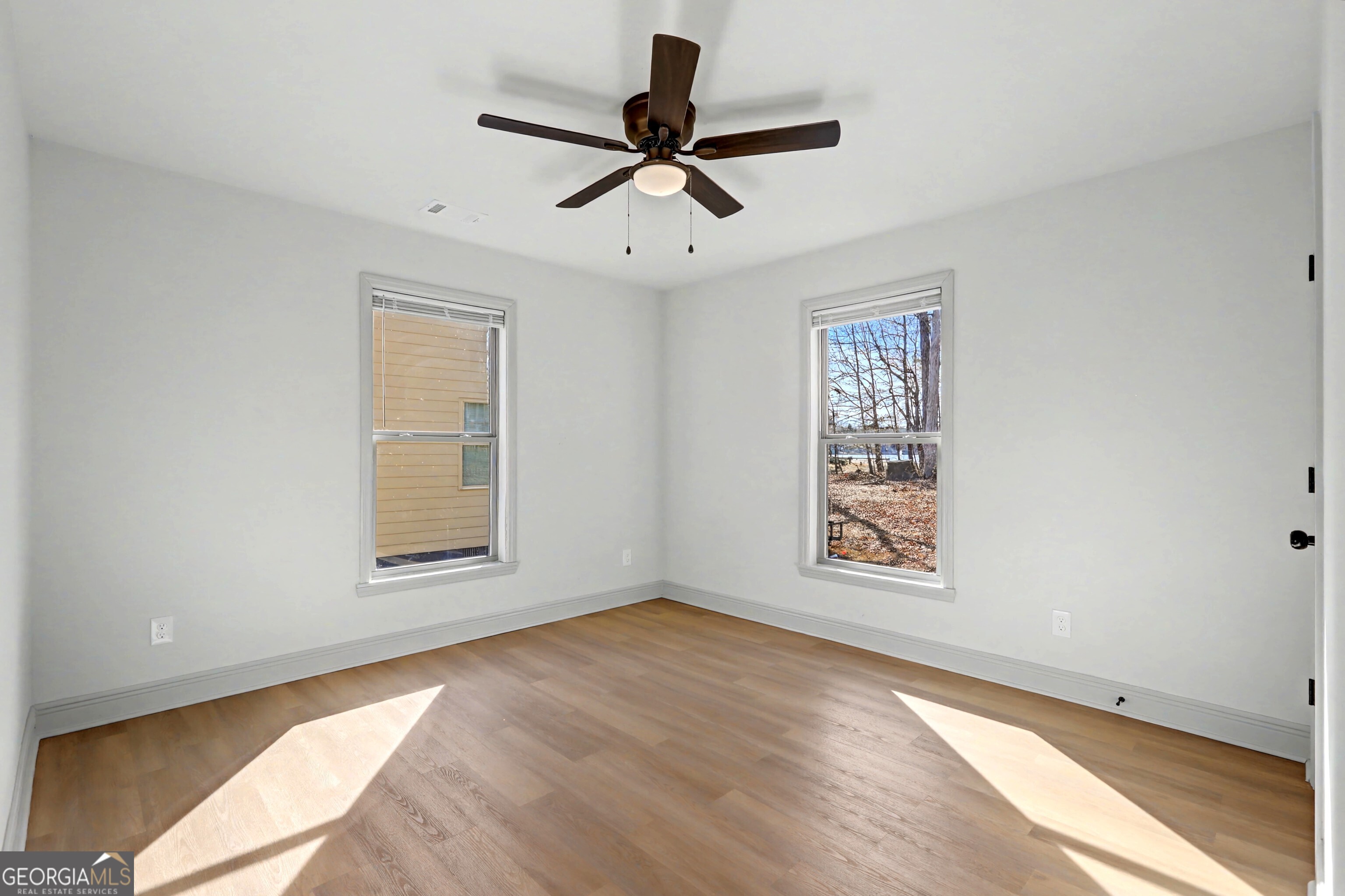 411 Loblolly Ridge Locust Grove, GA 30248 - Photo 22 of 43 a view of an empty room with a window