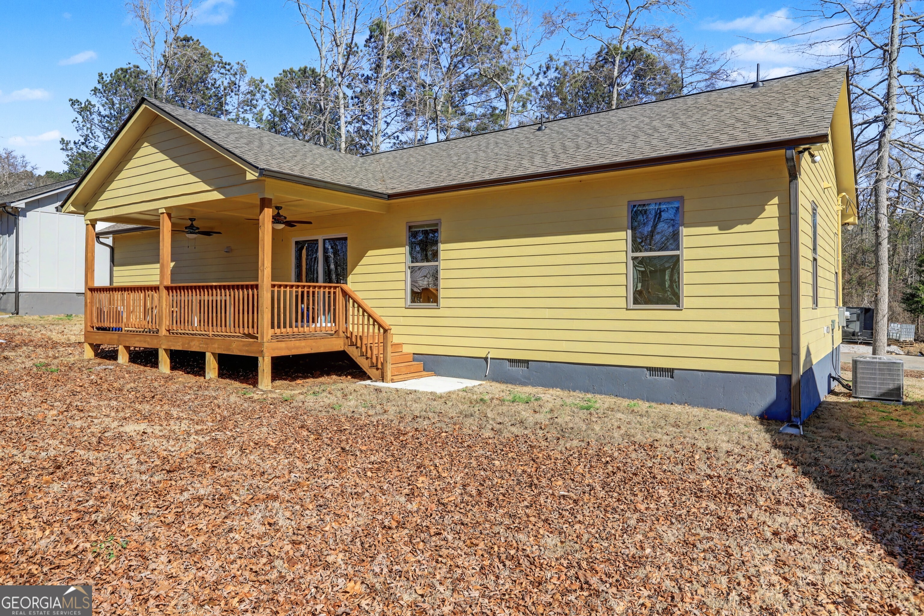 411 Loblolly Ridge Locust Grove, GA 30248 - Photo 28 of 43 front view of a house with a yard
