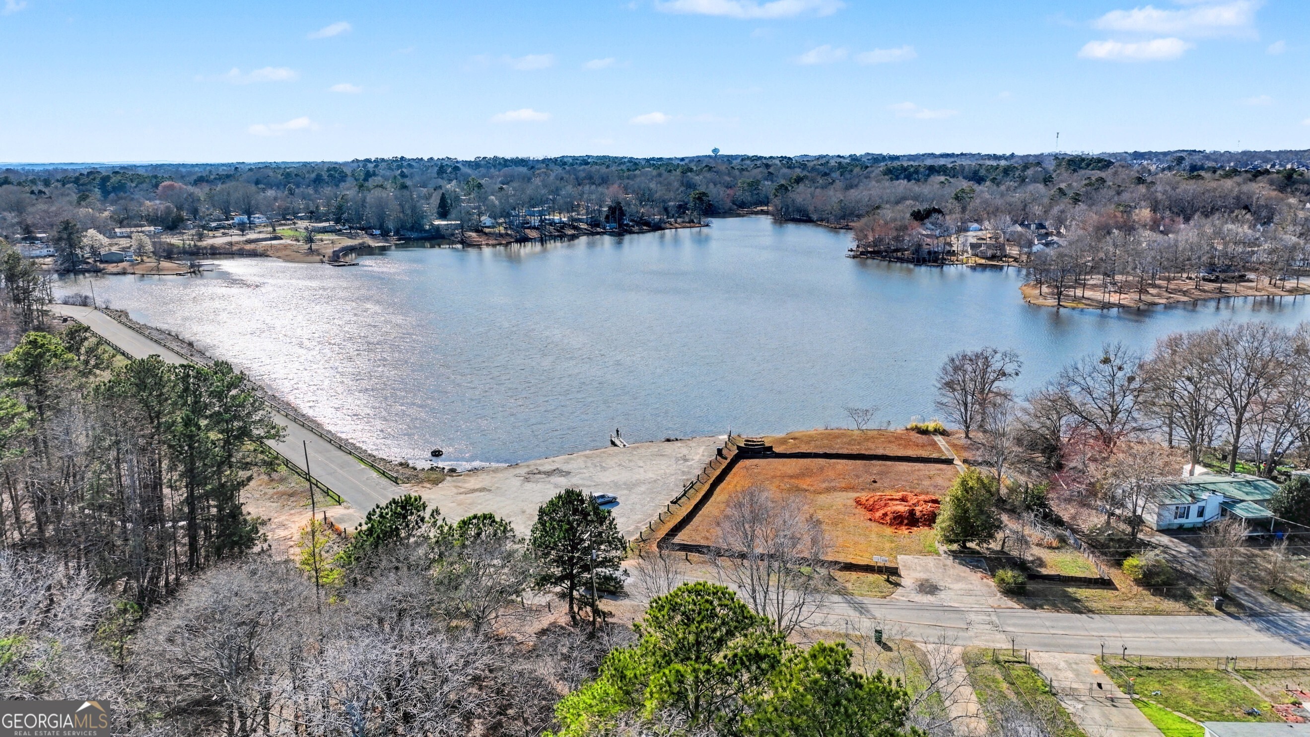 411 Loblolly Ridge Locust Grove, GA 30248 - Photo 43 of 43 an aerial view of a house with a lake view