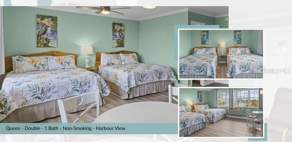 491 Dock Street Cedar Key, FL 32625 - Photo 12 of 22 a bedroom with two beds and painting on the wall