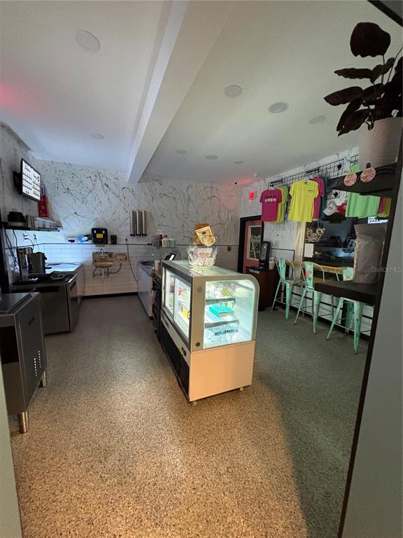 491 Dock Street Cedar Key, FL 32625 - Photo 21 of 22 a view of a storage & utility room with stuff