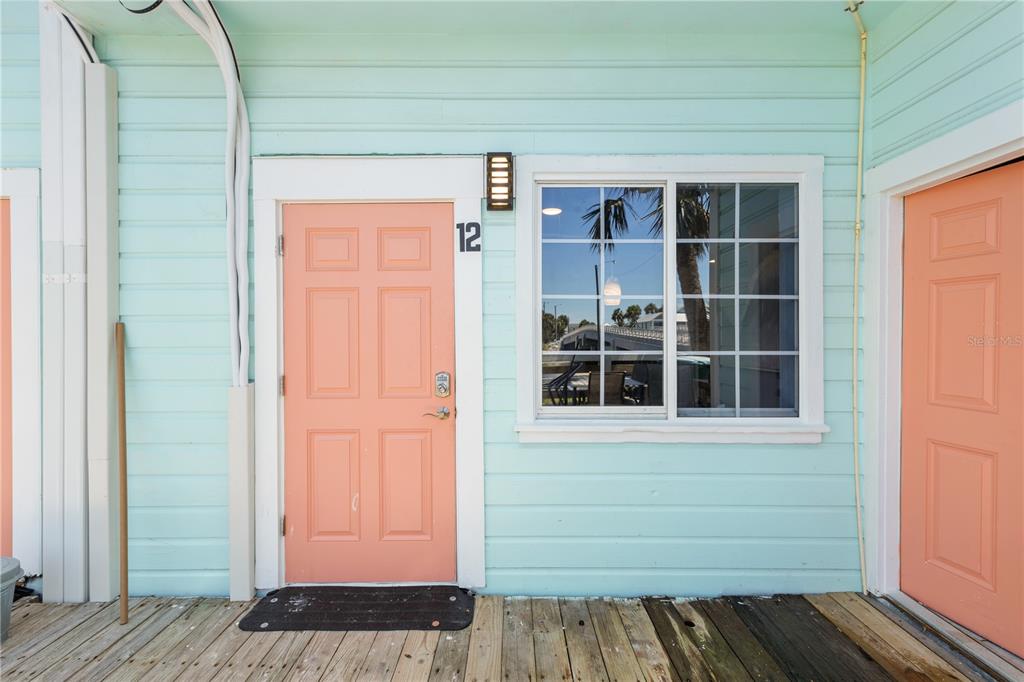 491 Dock Street Cedar Key, FL 32625 - Photo 4 of 22 a view of front door