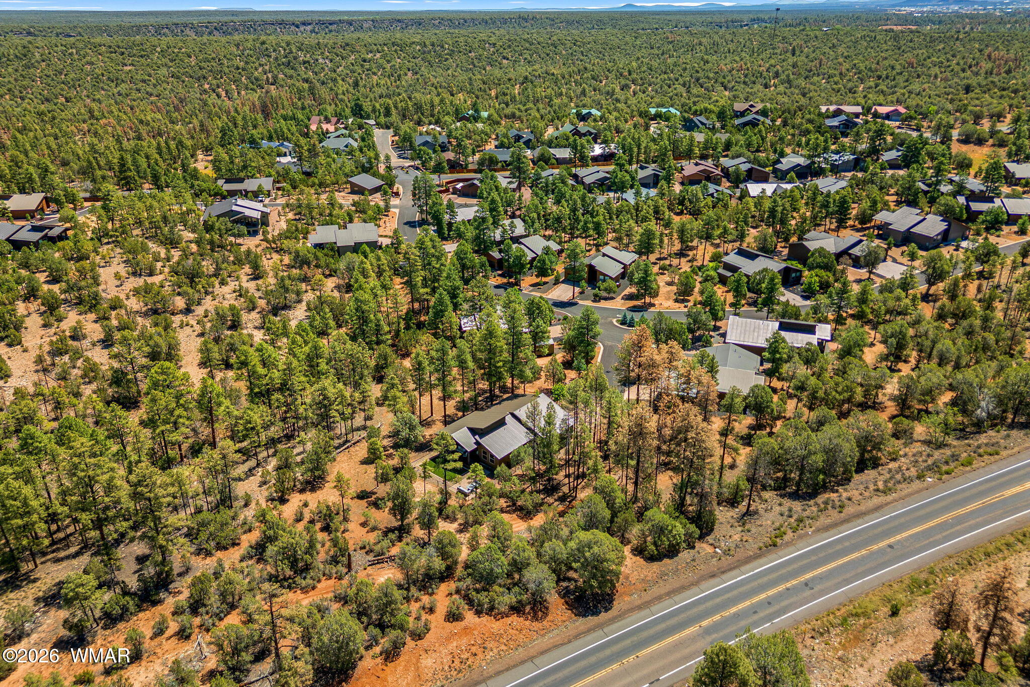 3161 North Eagle Landing Road Show Low, AZ 85901 - Photo 30 of 32 an aerial view of residential houses with outdoor space and trees