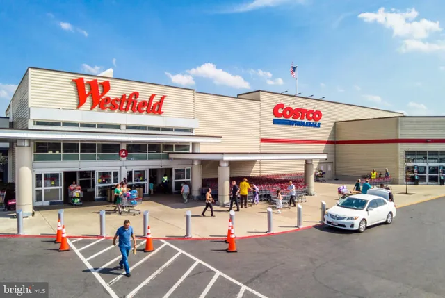 a view of a building with sitting area
