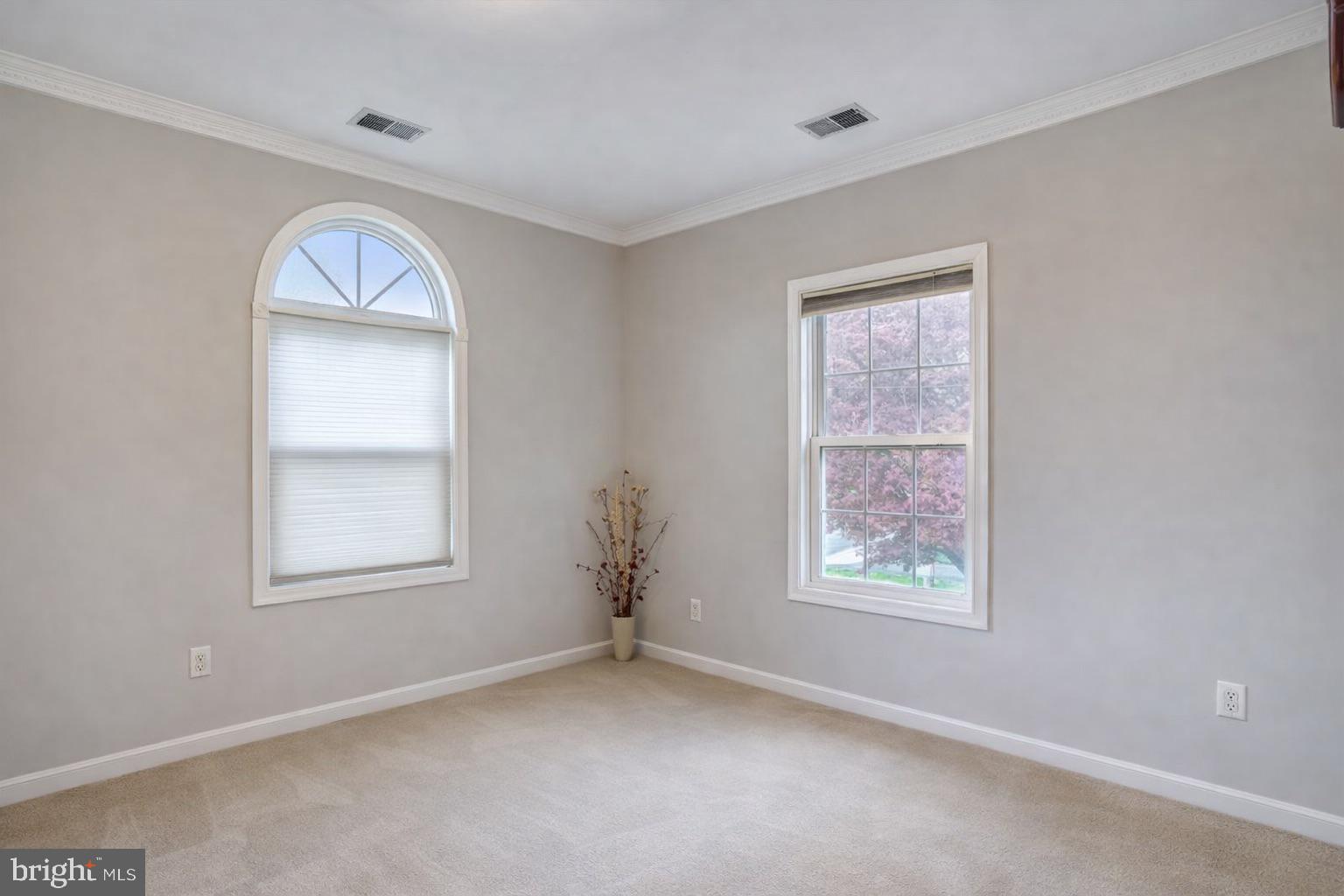 12304 Charles Road Silver Spring, MD 20906 - Photo 7 of 14 a view of an empty room with a window