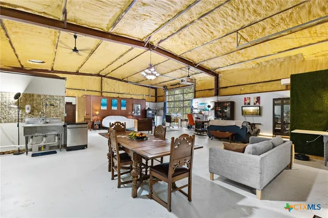 a view of a living room with furniture