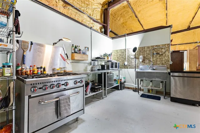 a view of living room with furniture and fireplace