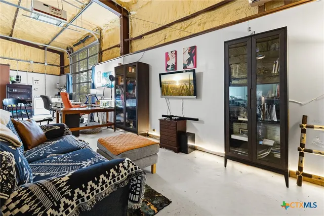 a outdoor space with lots of furniture and chandelier