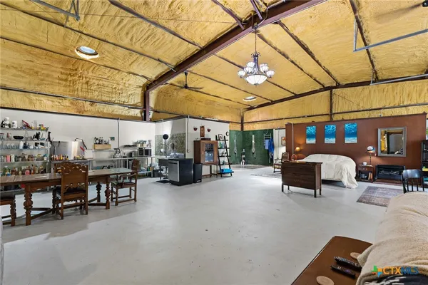 a view of a garage with furniture