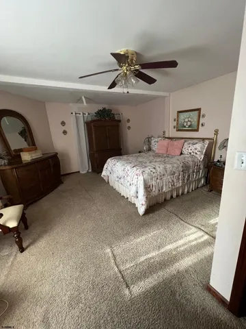 a bedroom with a bed and furniture