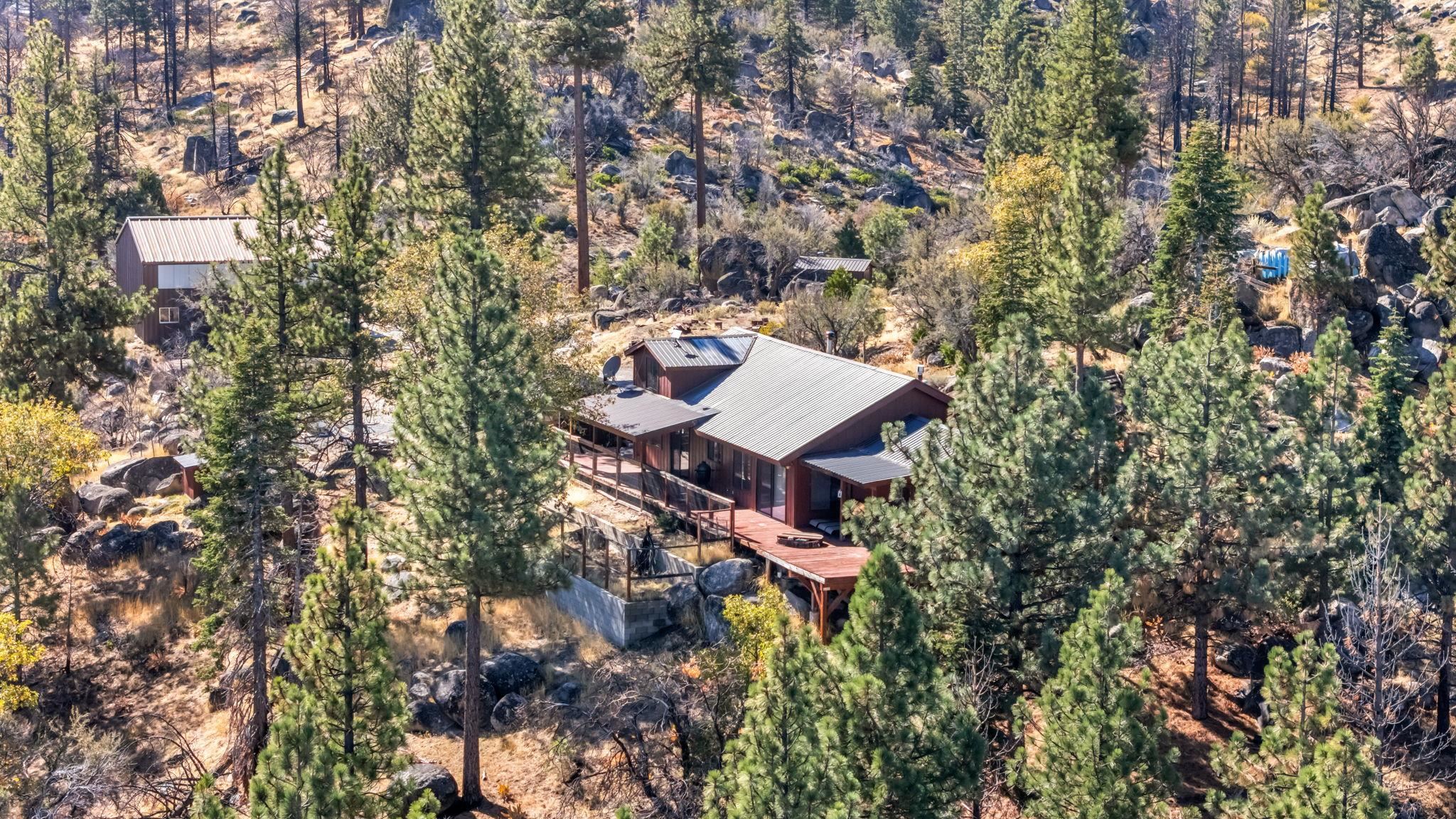740-935 Sugar Loaf Road Doyle, CA 96109 - Photo 23 of 25 a view of a house with a yard and sitting area