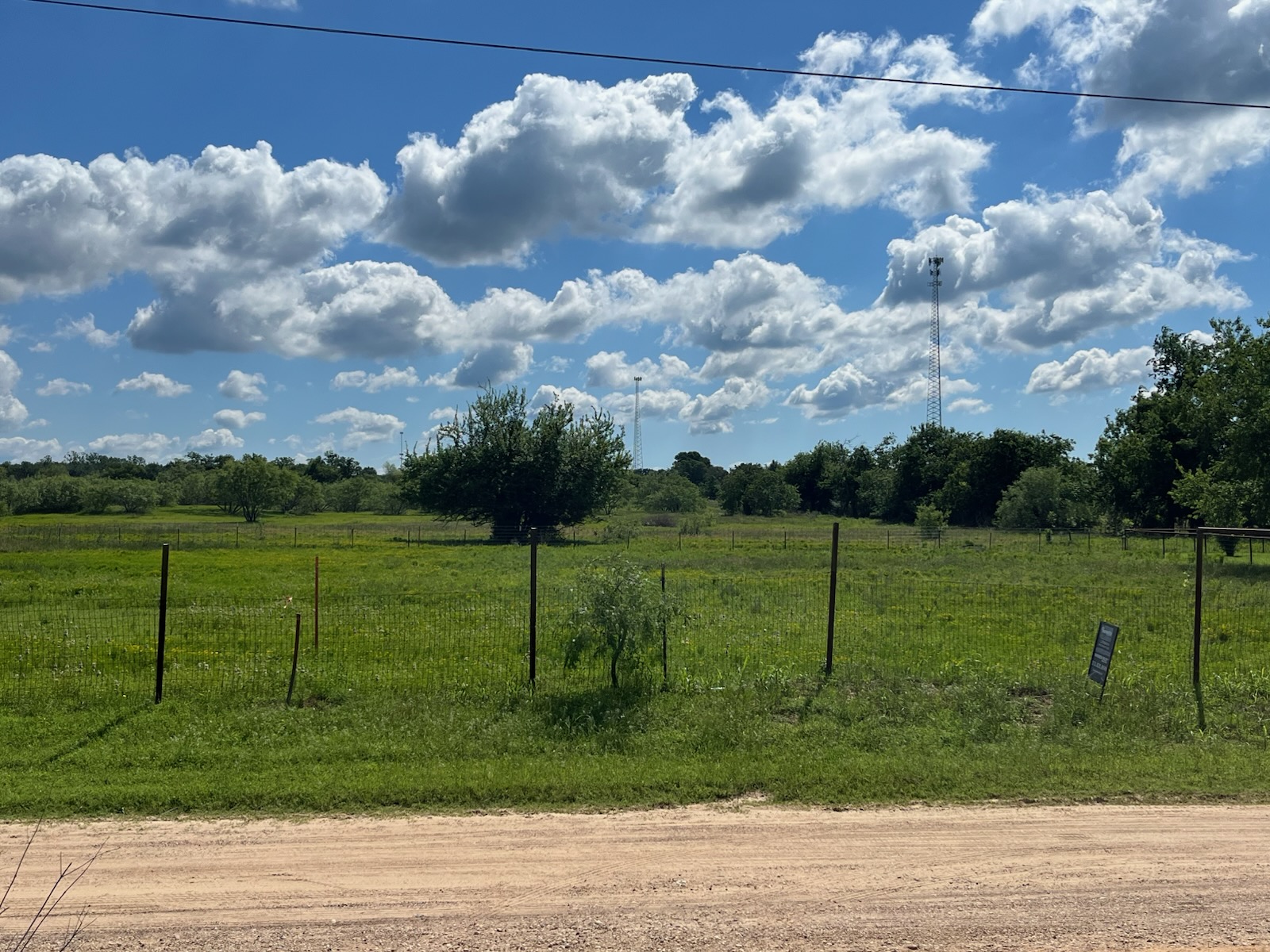 a view of a golf course with a lake