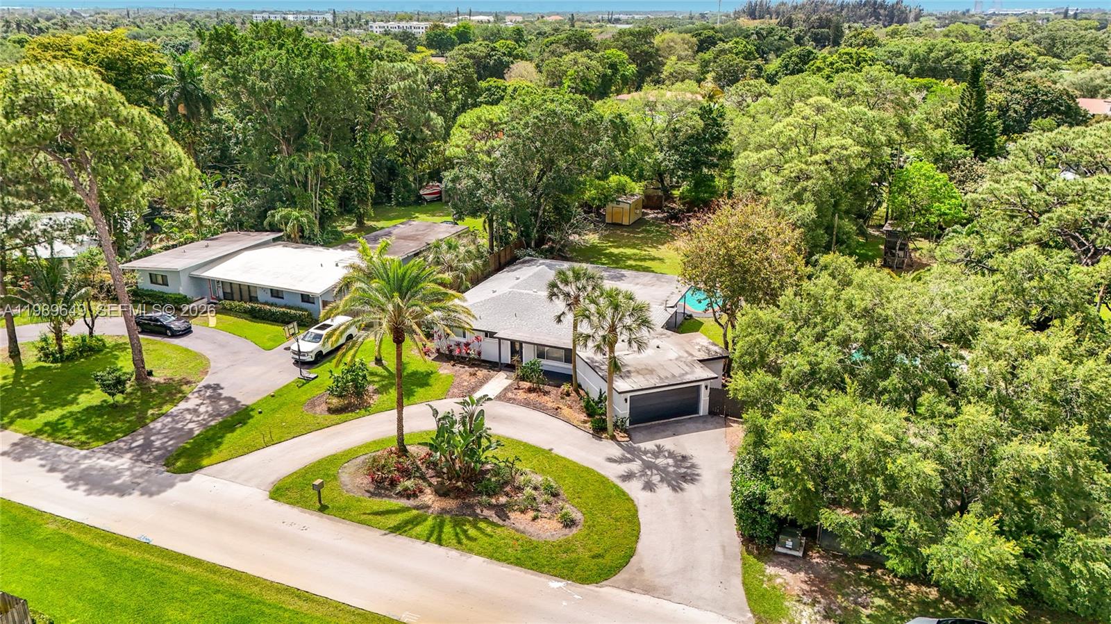 4330 Southwest 7th Street Plantation, FL 33317 - Photo 2 of 57 an aerial view of a house with a yard basket ball court