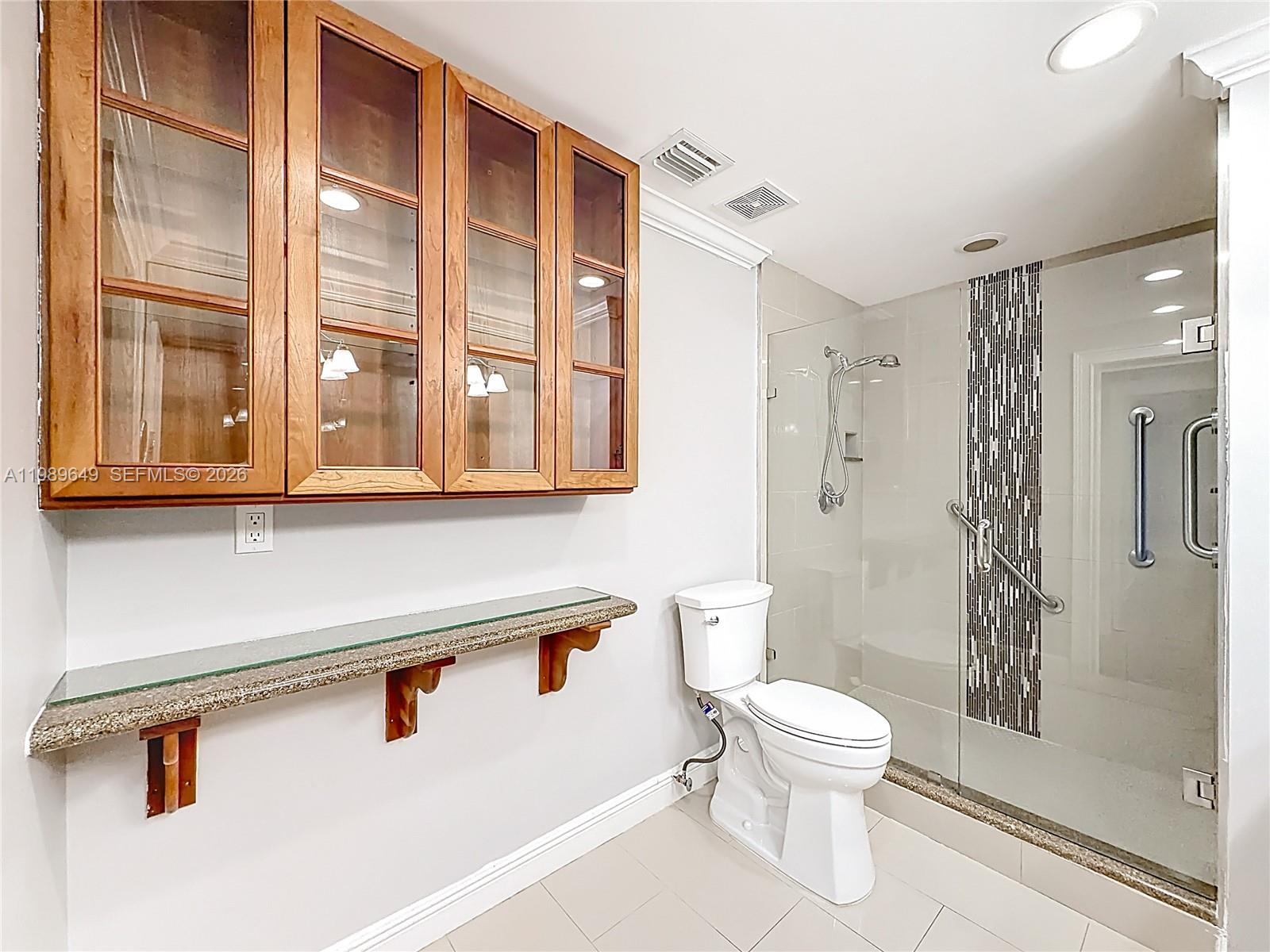 4330 Southwest 7th Street Plantation, FL 33317 - Photo 28 of 57 a bathroom with a toilet a sink and a shower