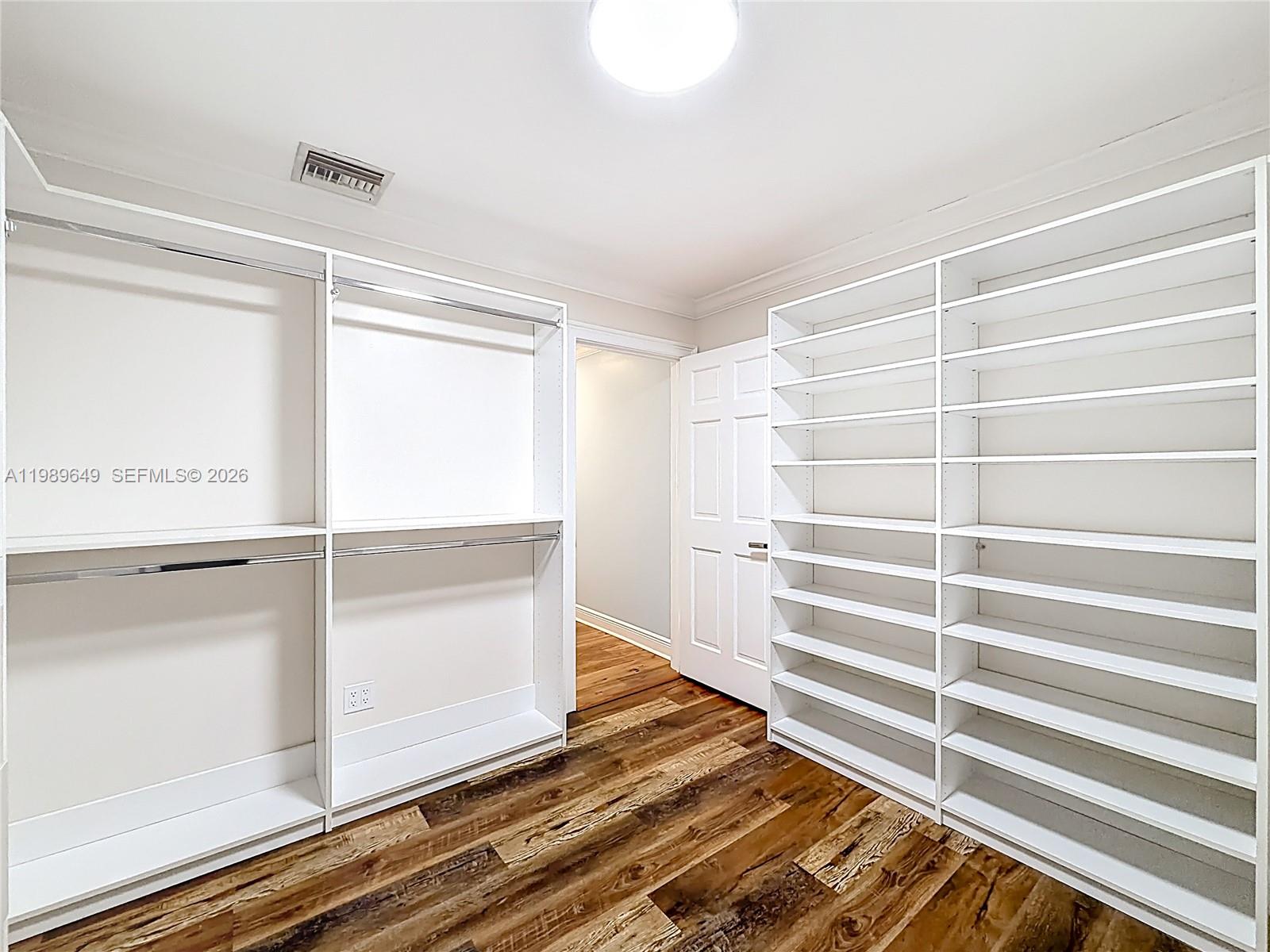4330 Southwest 7th Street Plantation, FL 33317 - Photo 32 of 57 a view of walk in closet with empty racks