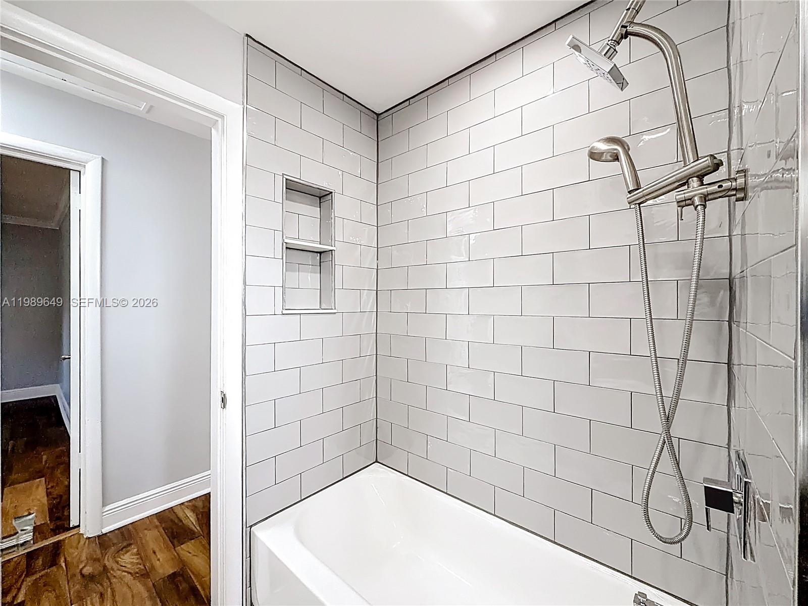 4330 Southwest 7th Street Plantation, FL 33317 - Photo 39 of 57 a bathroom with a bathtub and shower