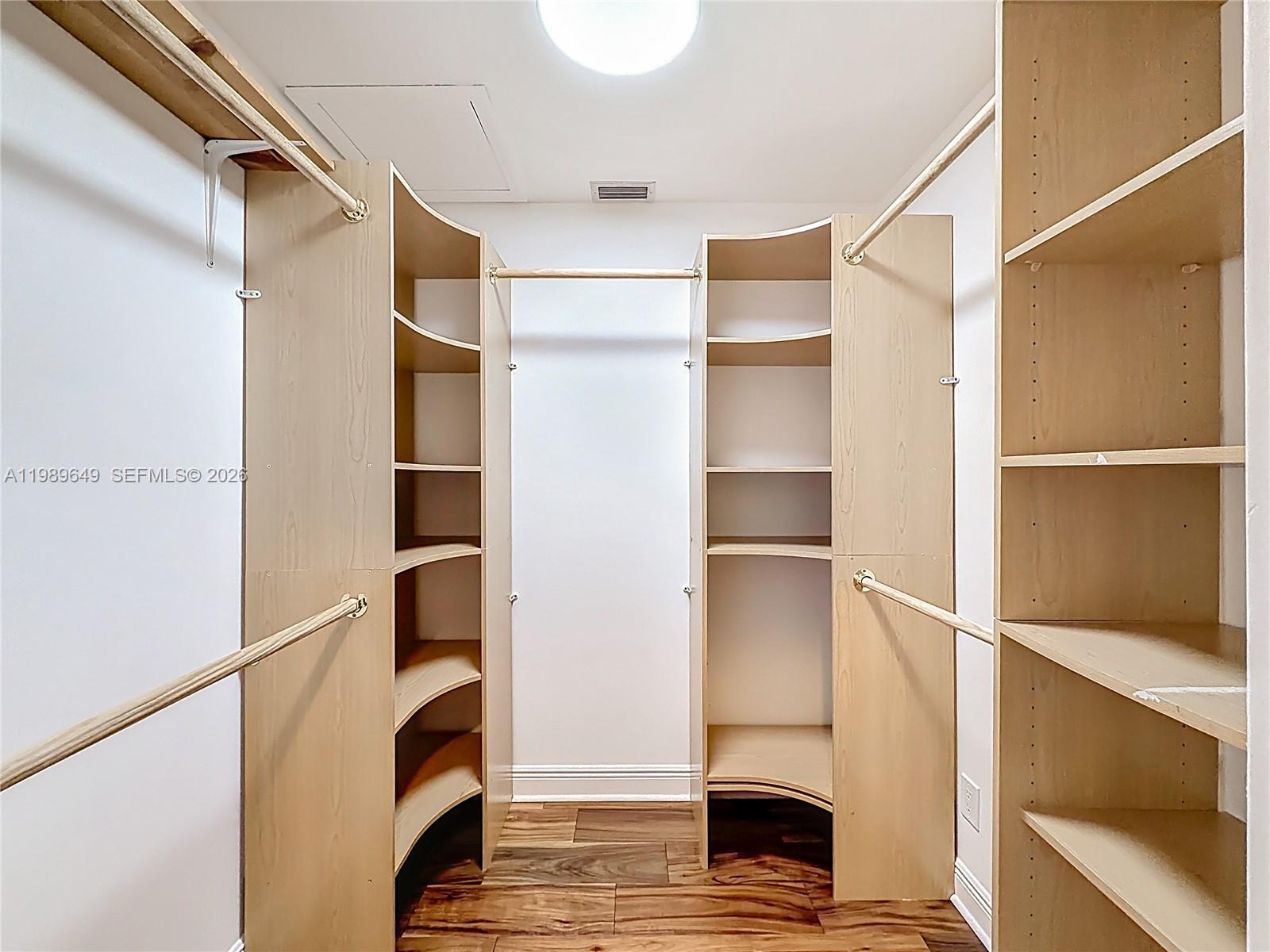4330 Southwest 7th Street Plantation, FL 33317 - Photo 41 of 57 a view of walk in closet with empty racks