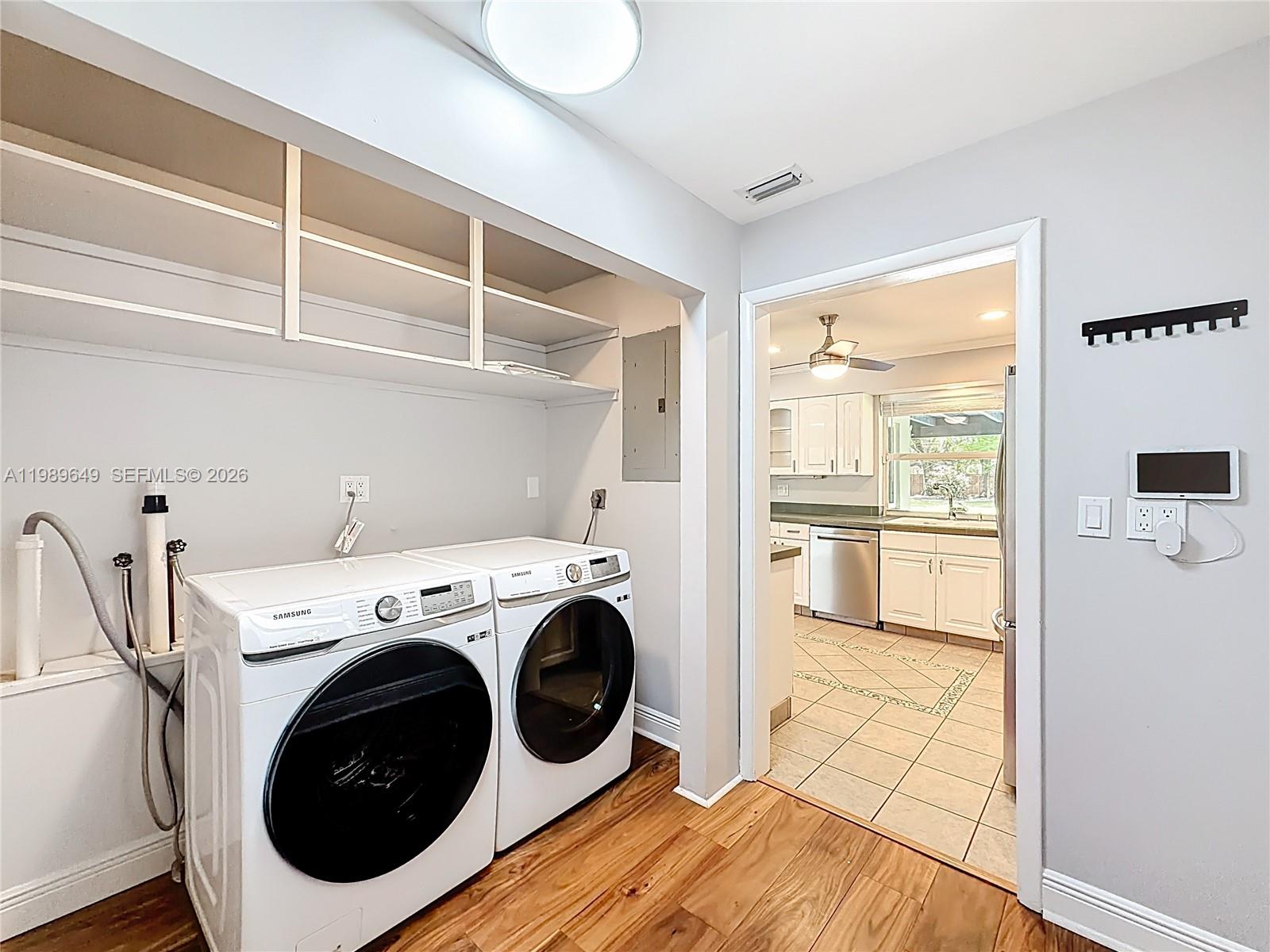 4330 Southwest 7th Street Plantation, FL 33317 - Photo 42 of 57 a utility room with dryer and washer