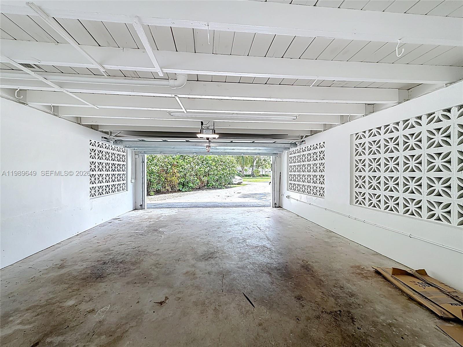 4330 Southwest 7th Street Plantation, FL 33317 - Photo 43 of 57 a view of an empty room with a window and outdoor space
