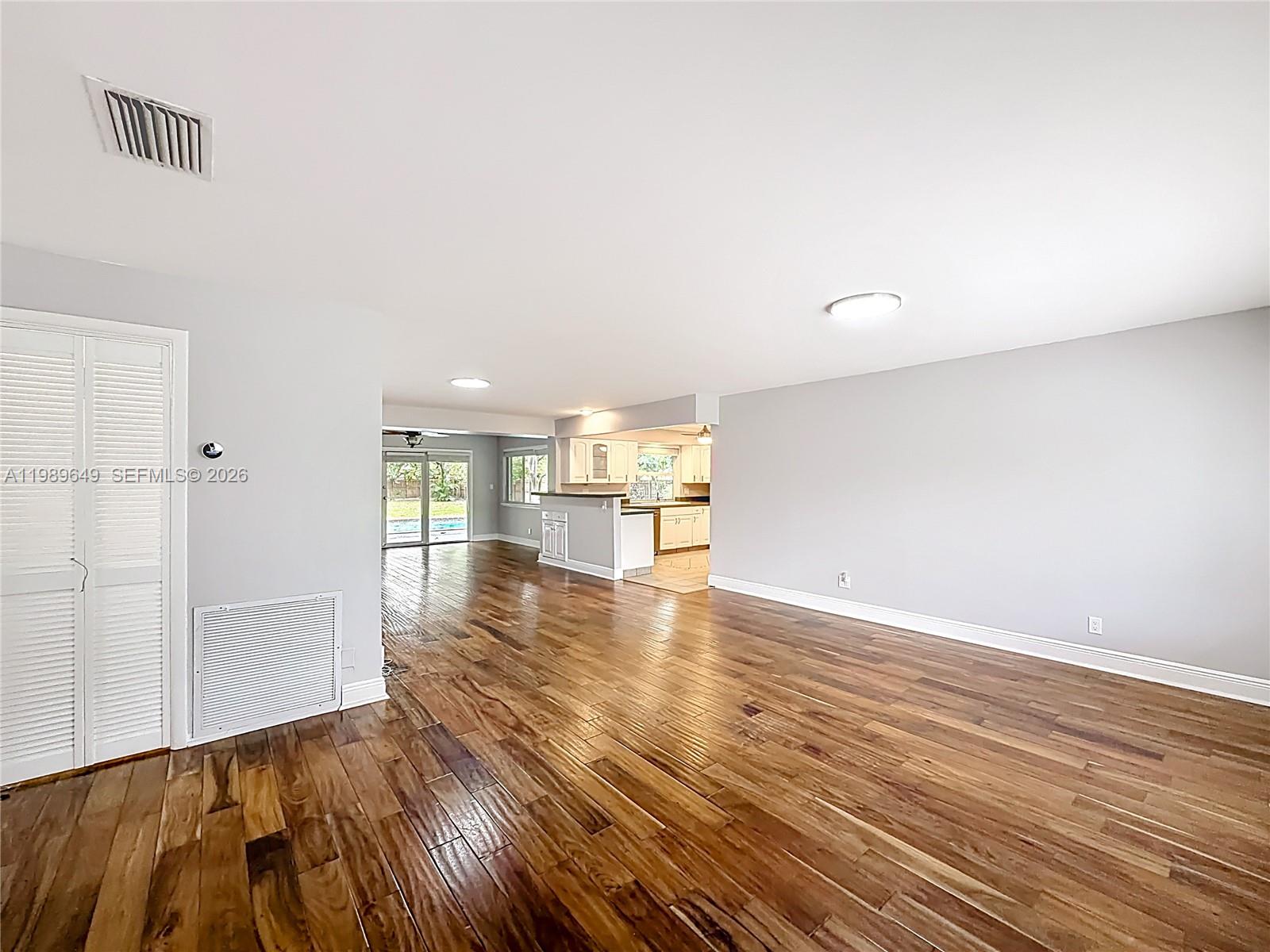 4330 Southwest 7th Street Plantation, FL 33317 - Photo 9 of 57 a view of a room with wooden floors and natural light