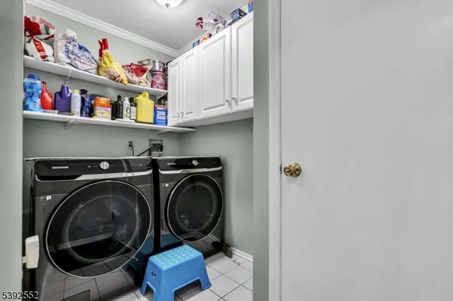 a storage room with washer and dryer