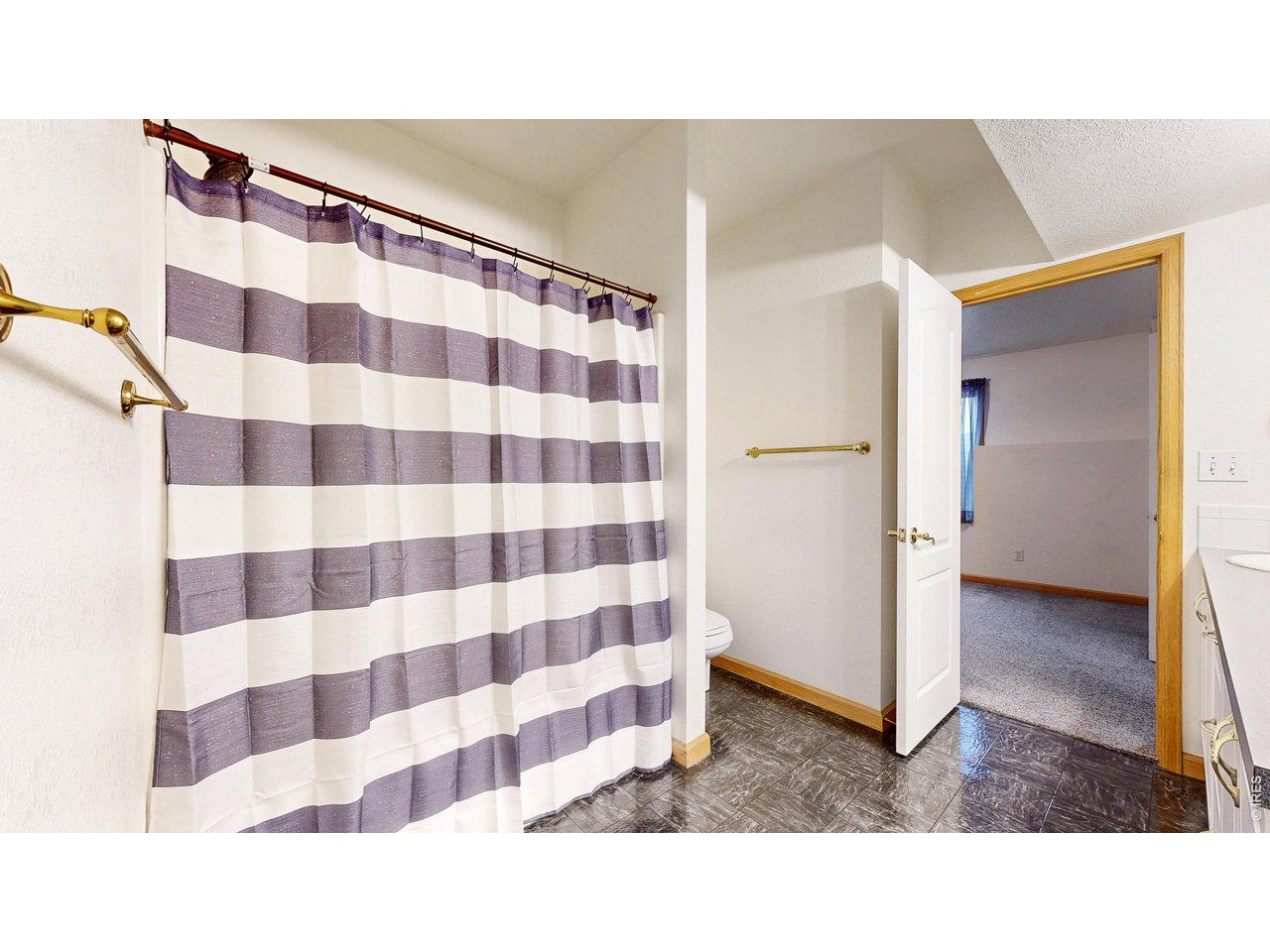 5017 West 6th Street Road Greeley, CO 80634 - Photo 39 of 42 Basement full bathroom