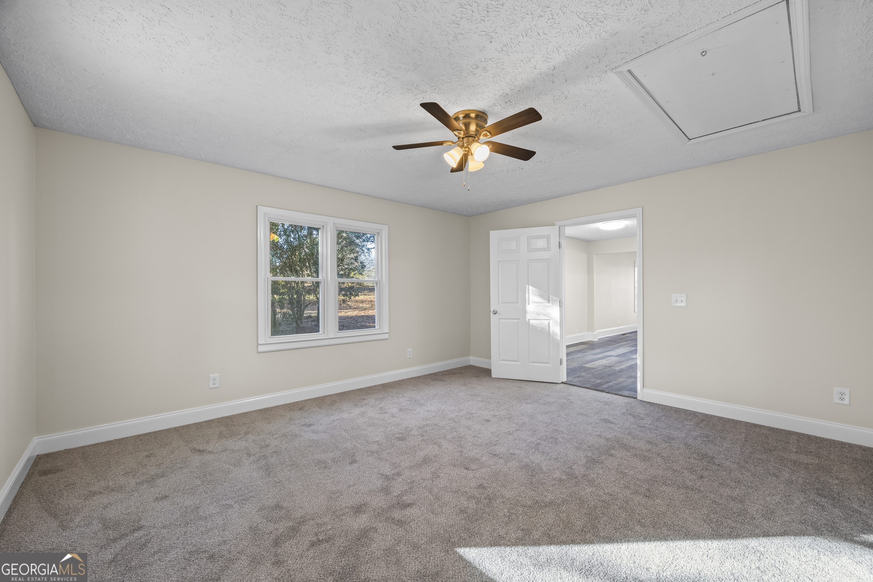 9750 Lavonia Road Carnesville, GA 30521 - Photo 23 of 49 a view of an empty room with a window