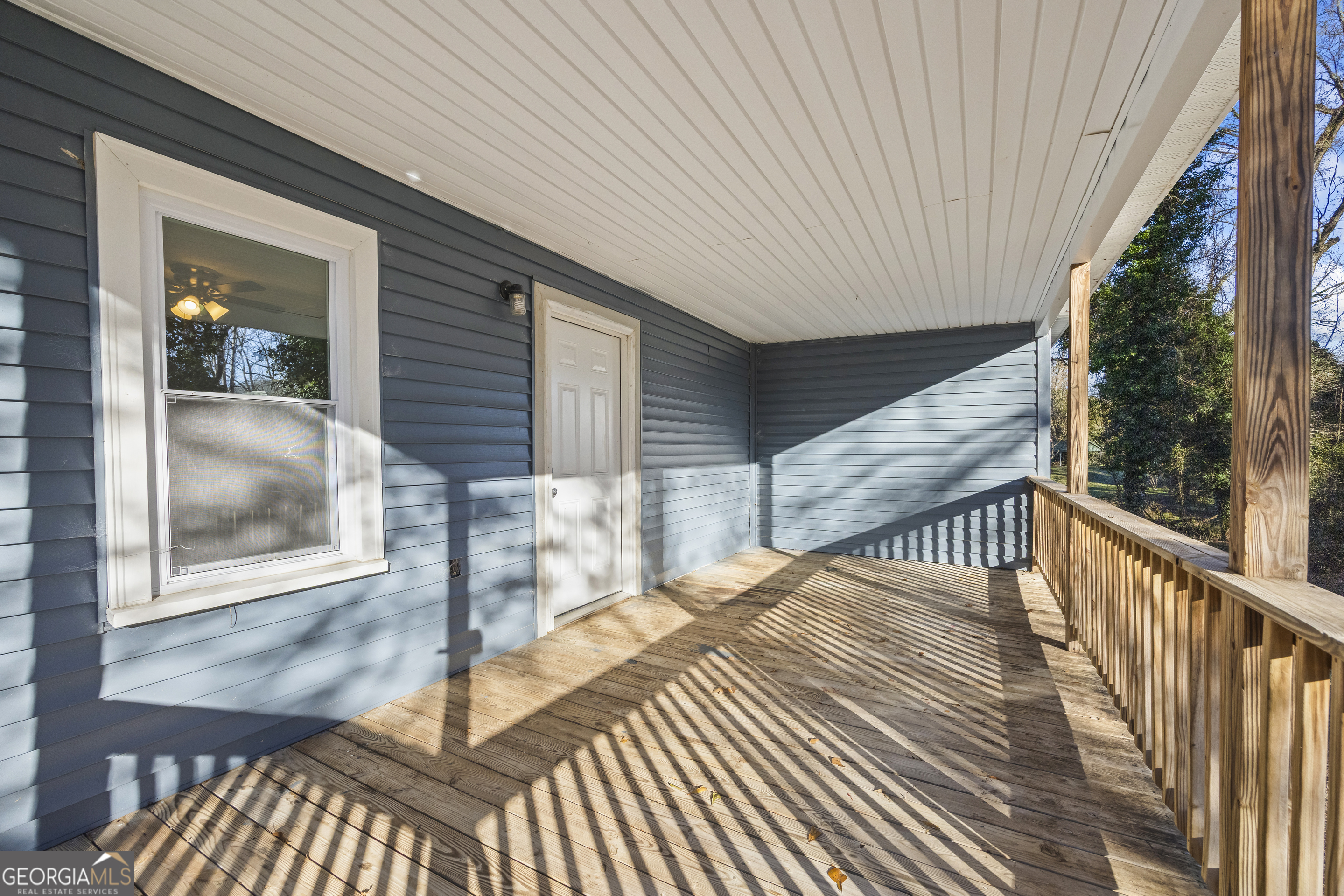 9750 Lavonia Road Carnesville, GA 30521 - Photo 41 of 49 a balcony with wooden floor