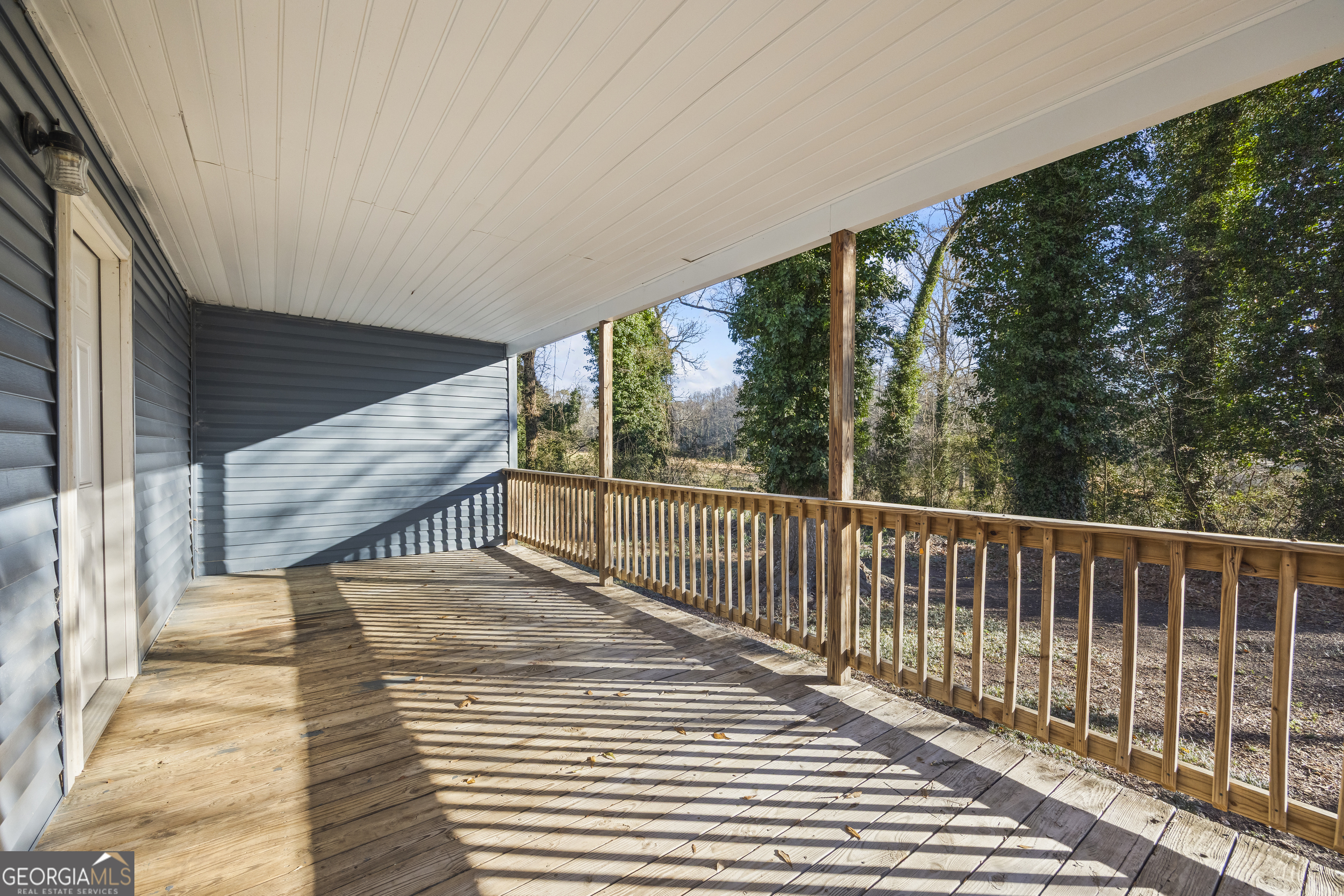 9750 Lavonia Road Carnesville, GA 30521 - Photo 43 of 49 a balcony with wooden floor
