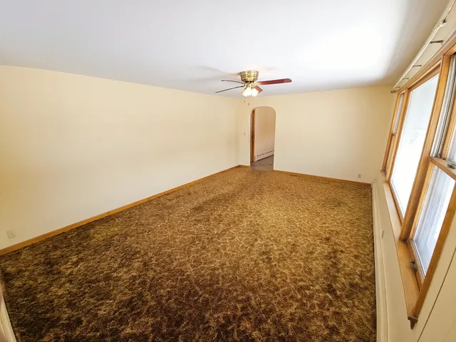 view of an empty room with a window