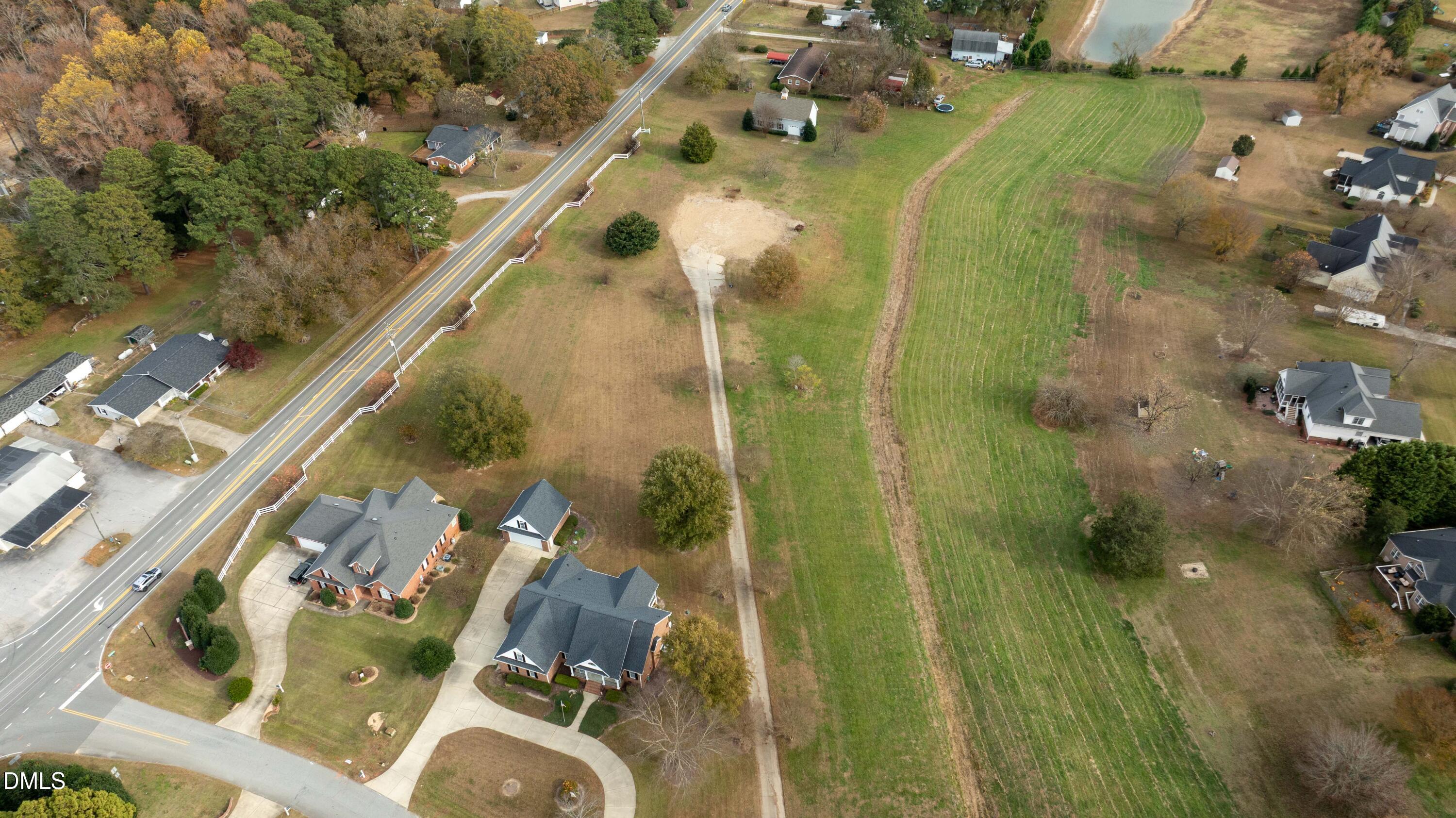 90 Rand Road Raleigh, NC 27603 - Photo 2 of 3 an aerial view of residential houses with outdoor space