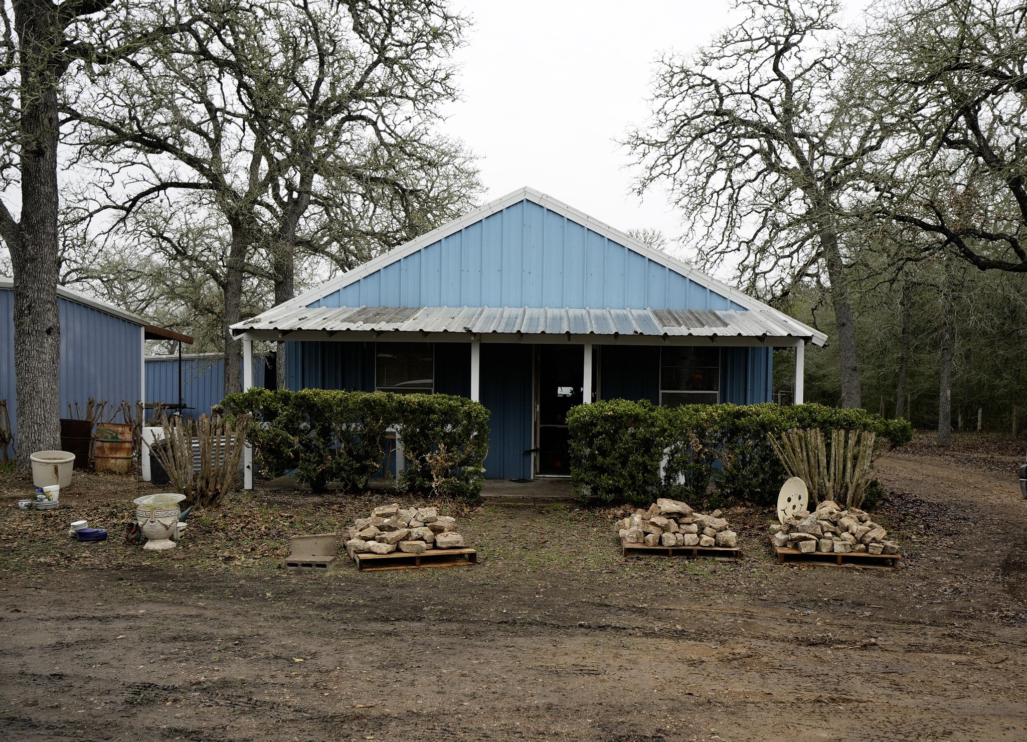 4731 Krischke Road Schulenburg, TX 78956 - Photo 11 of 40 a front view of a house with a yard and outdoor seating
