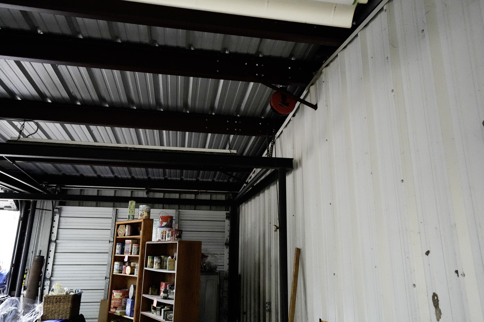 4731 Krischke Road Schulenburg, TX 78956 - Photo 18 of 40 a view of a hallway with wooden shelves