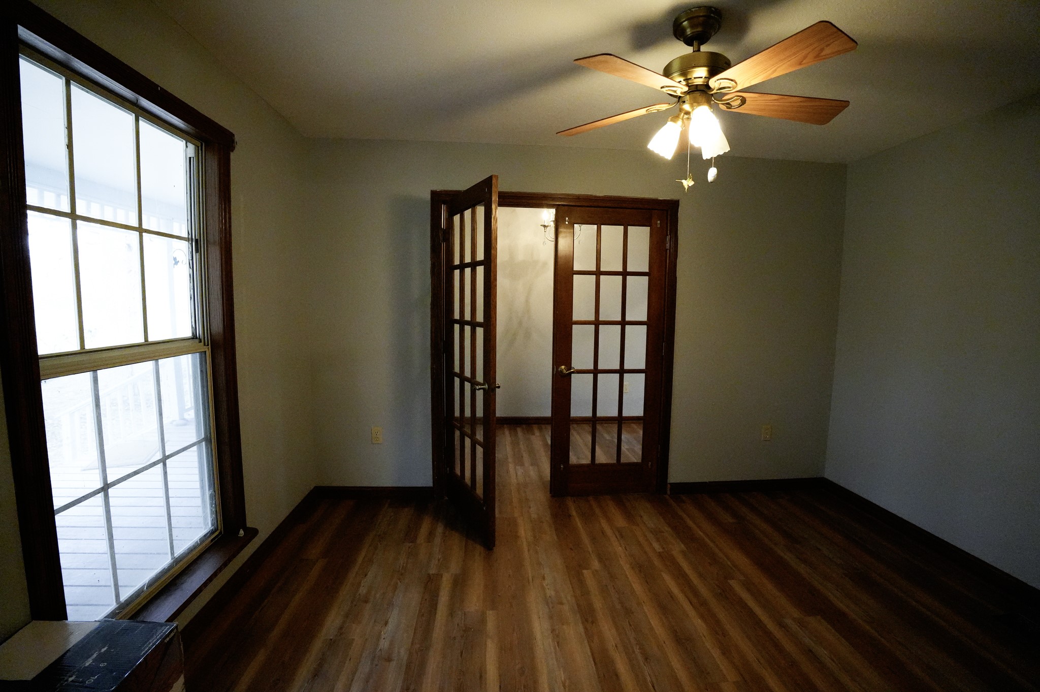 4731 Krischke Road Schulenburg, TX 78956 - Photo 25 of 40 wooden floor in an empty room with a window